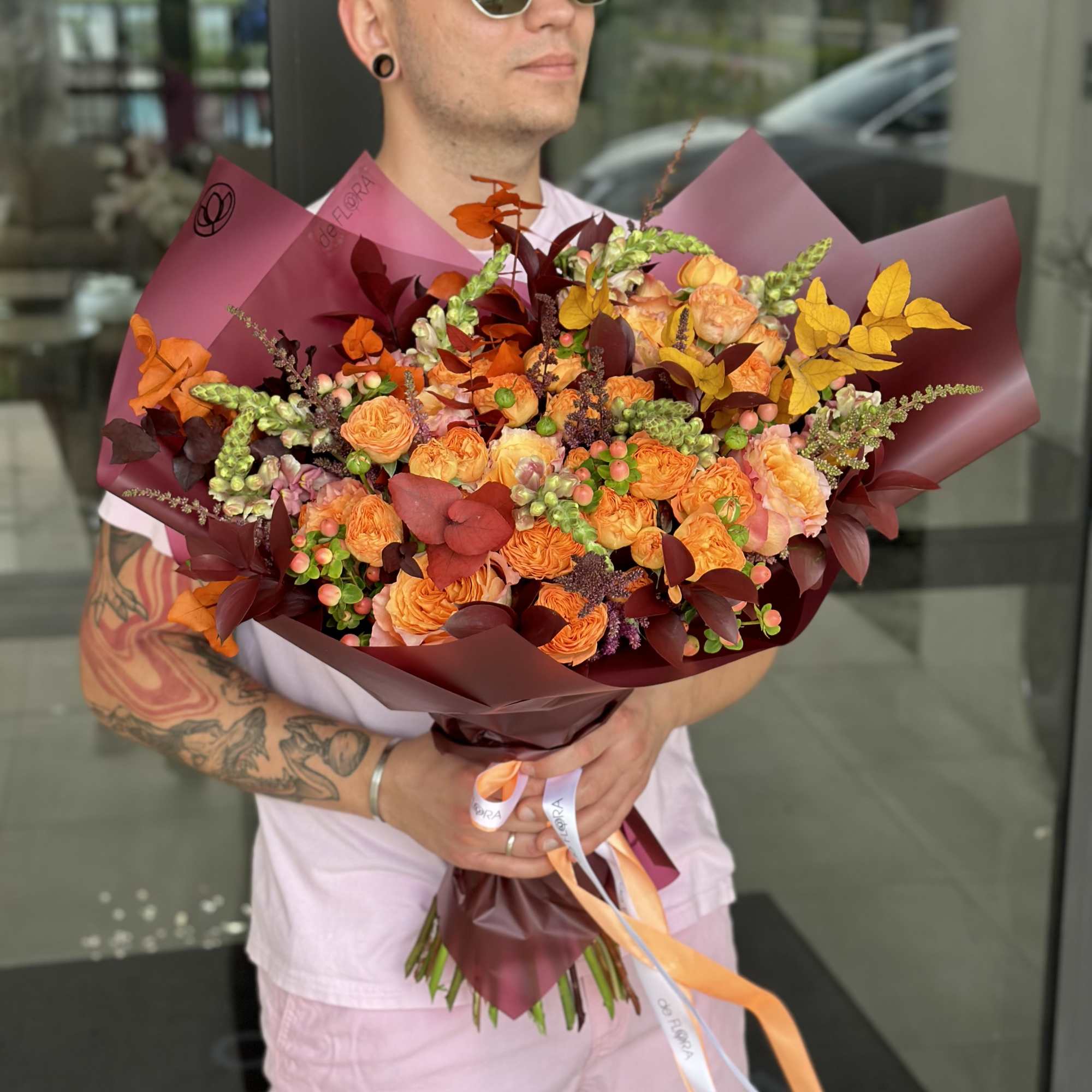 Bouquet of spray garden roses, premium roses, hypericum, astilbe, eucalyptus and ruscus. Bouquet of spray garden roses, premium roses, hypericum, astilbe, eucalyptus and ruscus.