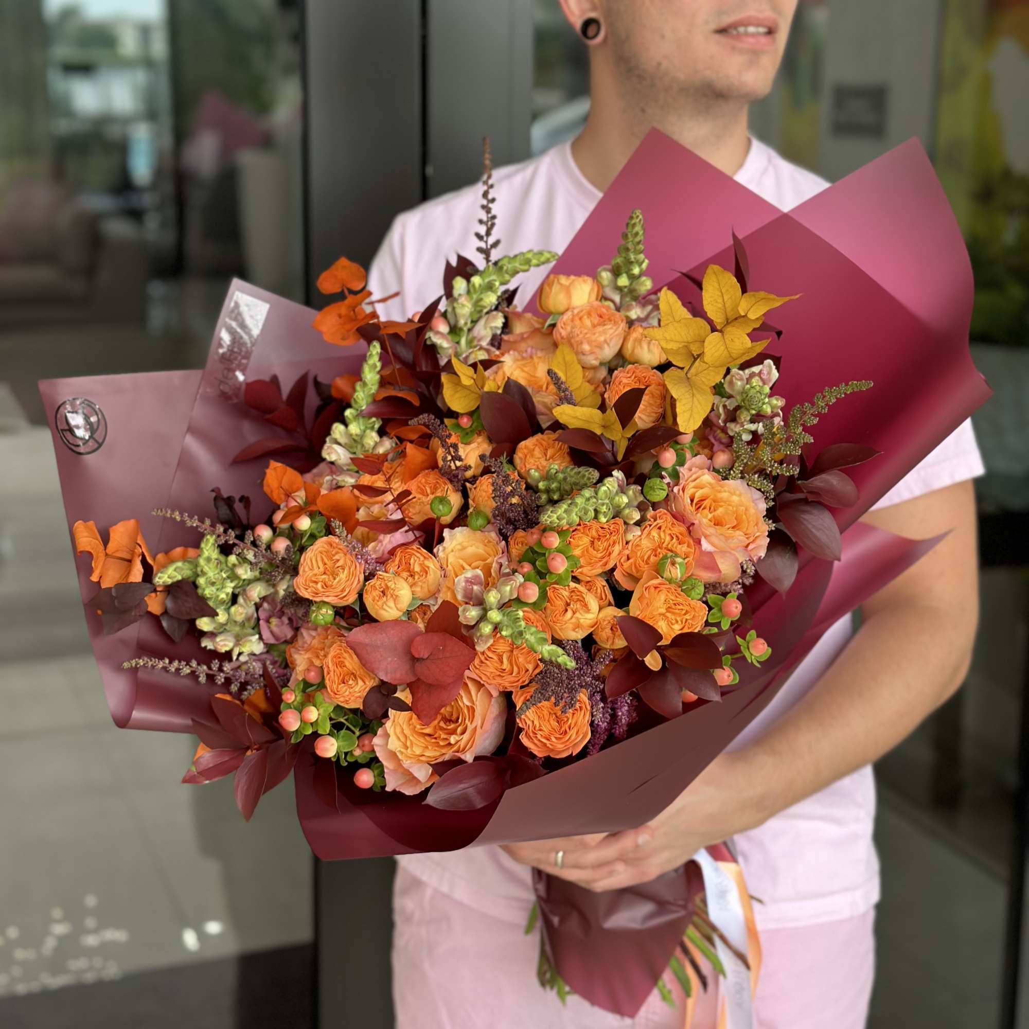 Bouquet of spray garden roses, premium roses, hypericum, astilbe, eucalyptus and ruscus. Bouquet of spray garden roses, premium roses, hypericum, astilbe, eucalyptus and ruscus.