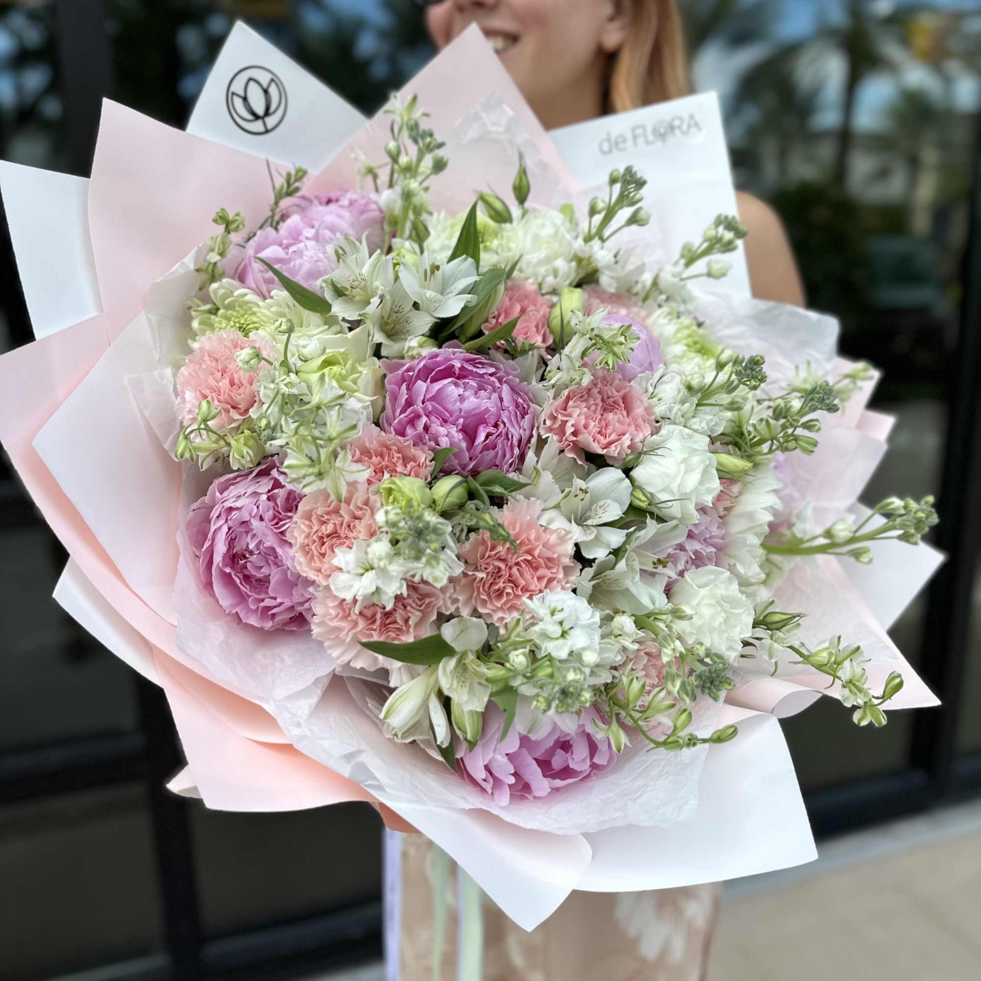 Bouquet of peonies, lisianthus, carnations, alstroemerias and stocks.  Bouquet of peonies, lisianthus, carnations, alstroemerias and stocks.