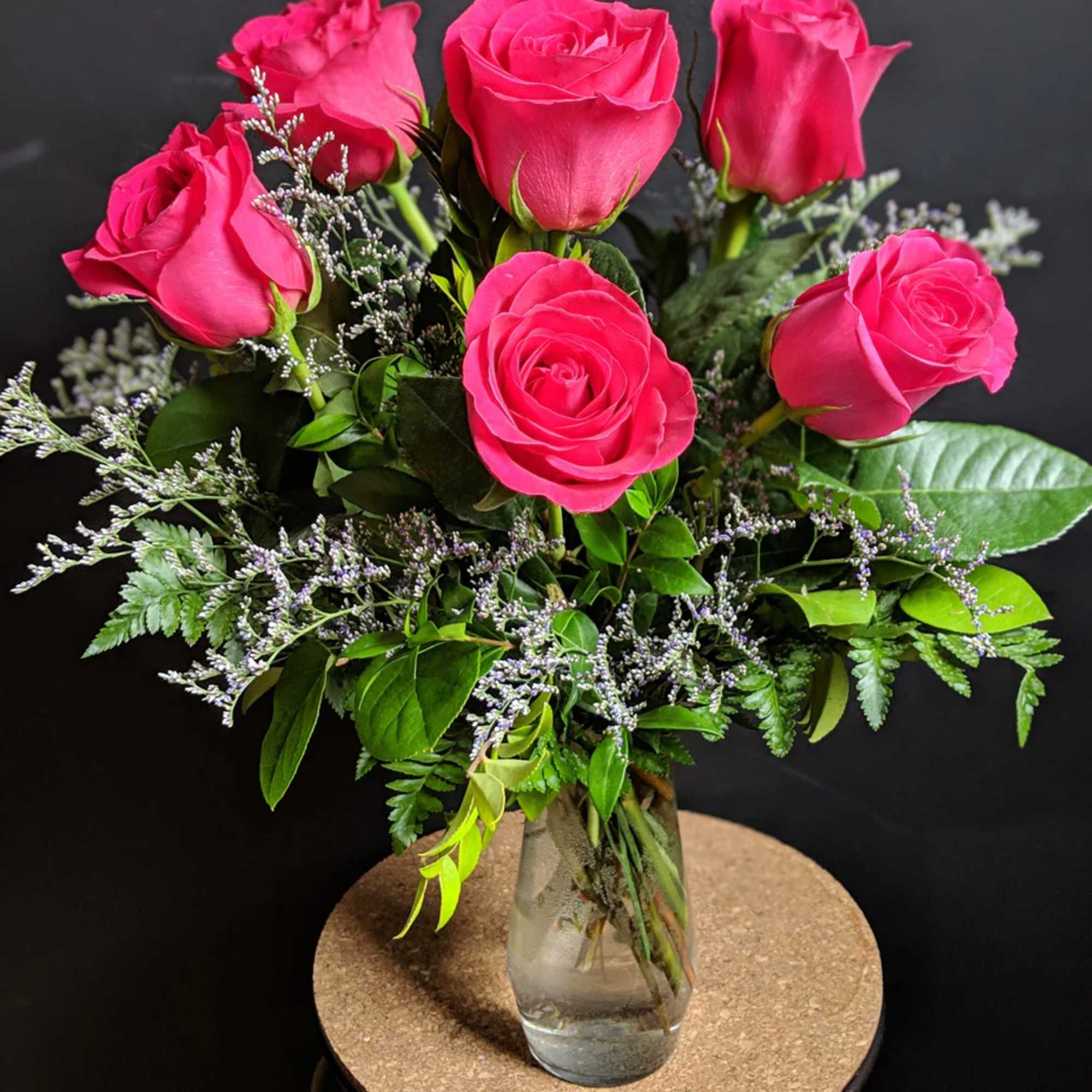 The perfect gift! One dozen elegant long-stemmed roses tastefully arranged with babies' The perfect gift! One dozen elegant long-stemmed roses tastefully arranged with babies'