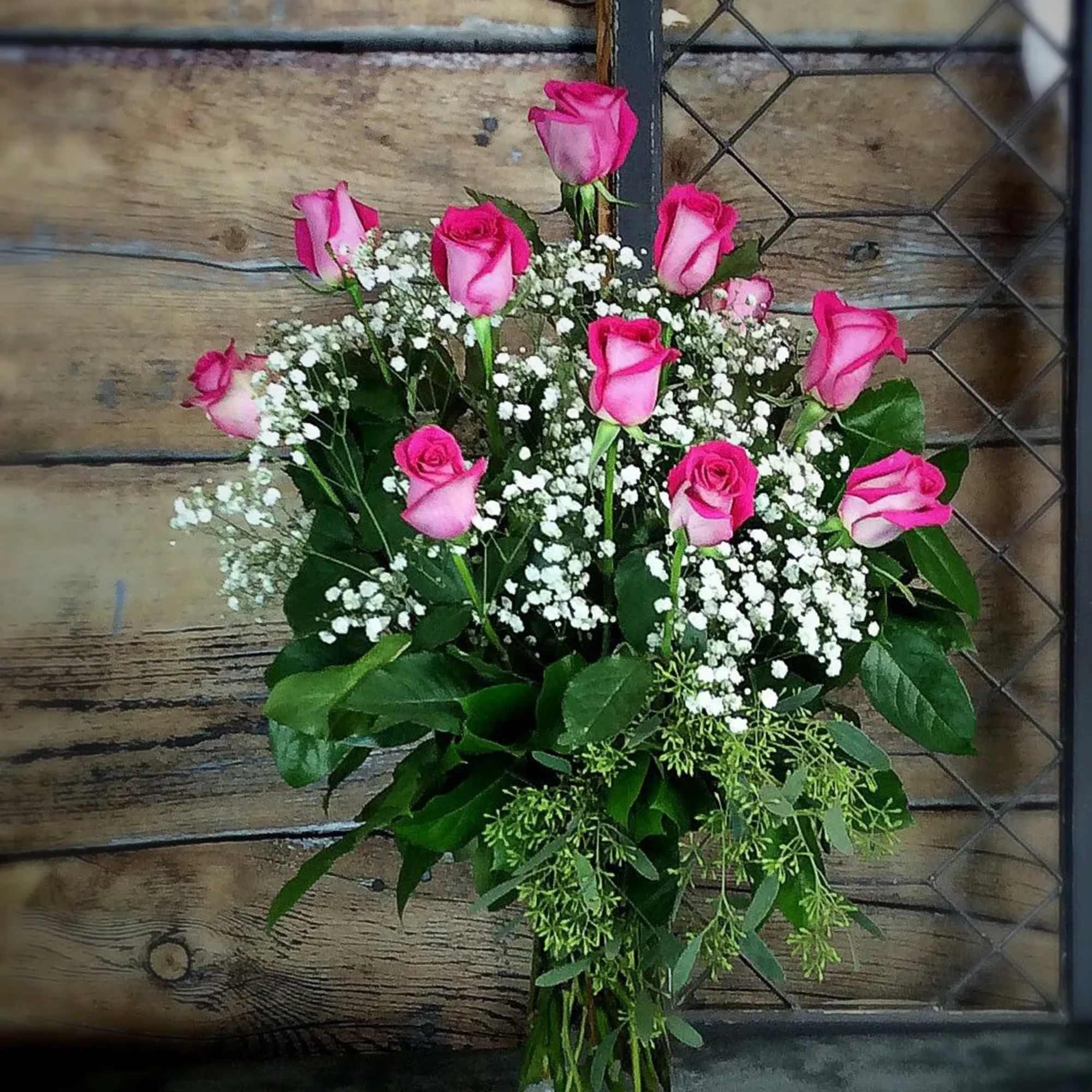 The perfect gift! One dozen elegant long-stemmed roses tastefully arranged with babies' The perfect gift! One dozen elegant long-stemmed roses tastefully arranged with babies'