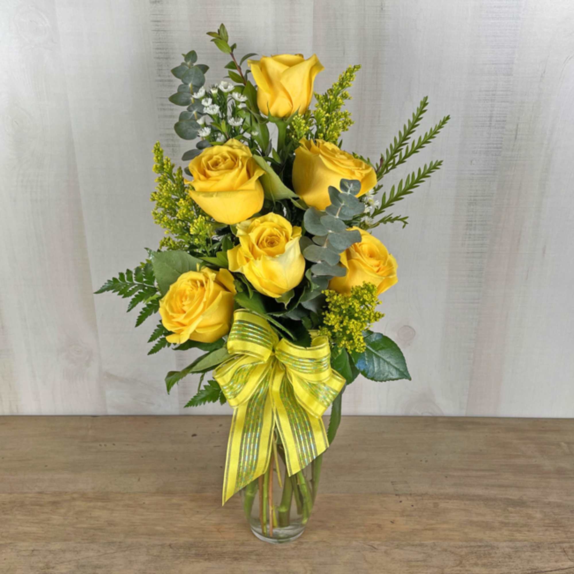 Brighten any celebration with a beautiful and brilliant bouquet of premium long-stem Brighten any celebration with a beautiful and brilliant bouquet of premium long-stem