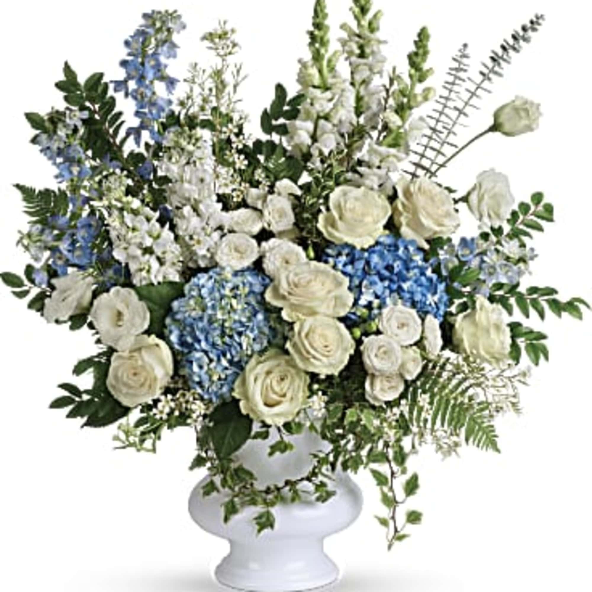 A treasured tribute to your beloved, this gorgeously grand bouquet of soft