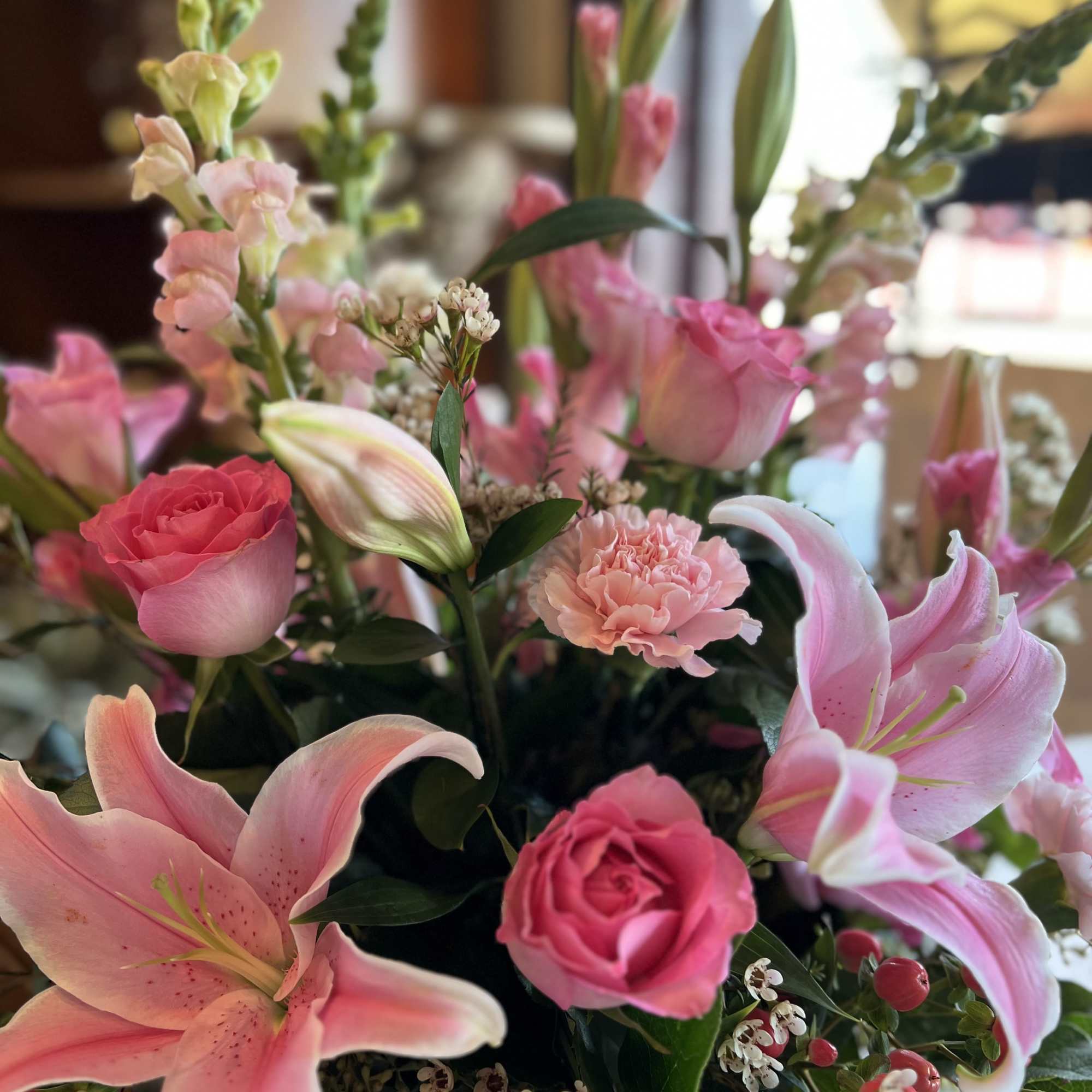 This all-pink grand arrangement is a showstopper, designed to captivate with its