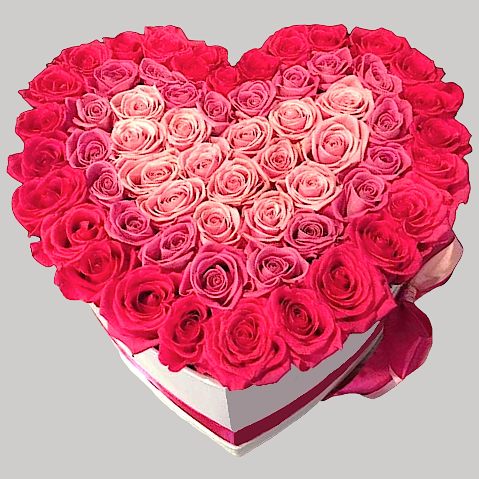 A modern flower arrangement in a heart box filled with roses.

DETAILS
This heart