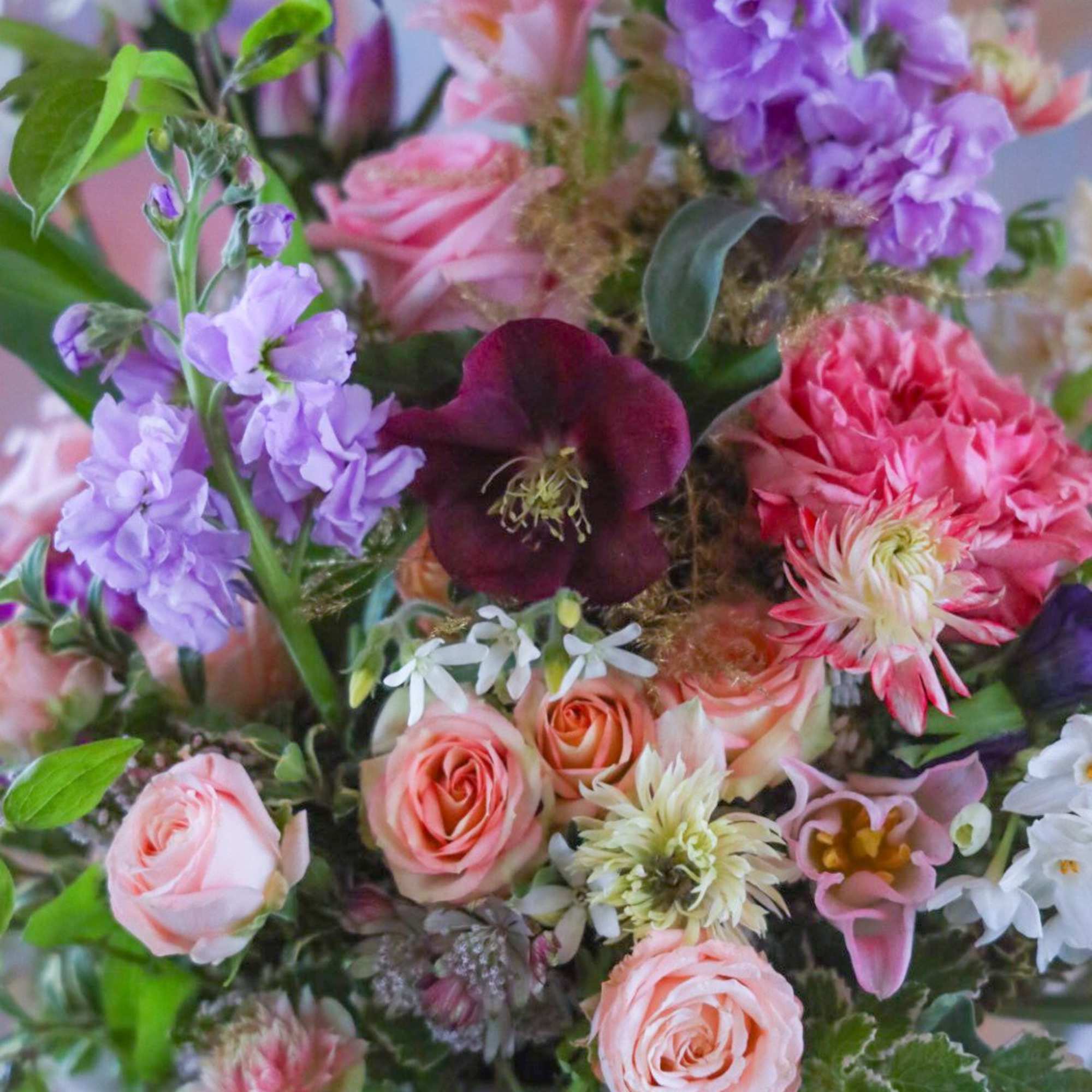 The Secret Garden Arrangement
A key unlocks a flora filled view. Like a