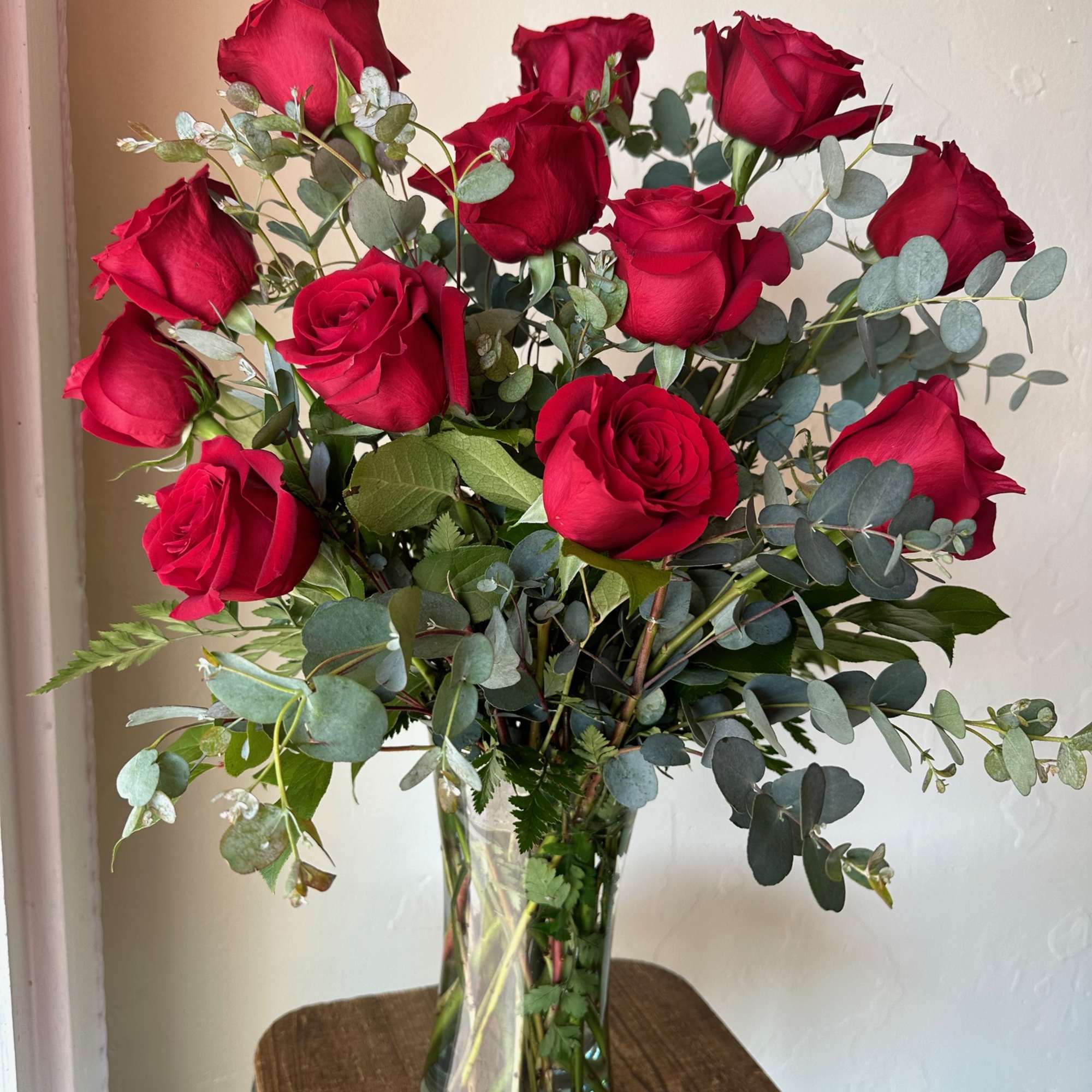 Standard price is as pictured. Deluxe pricing includes accent flower and additional Standard price is as pictured. Deluxe pricing includes accent flower and additional