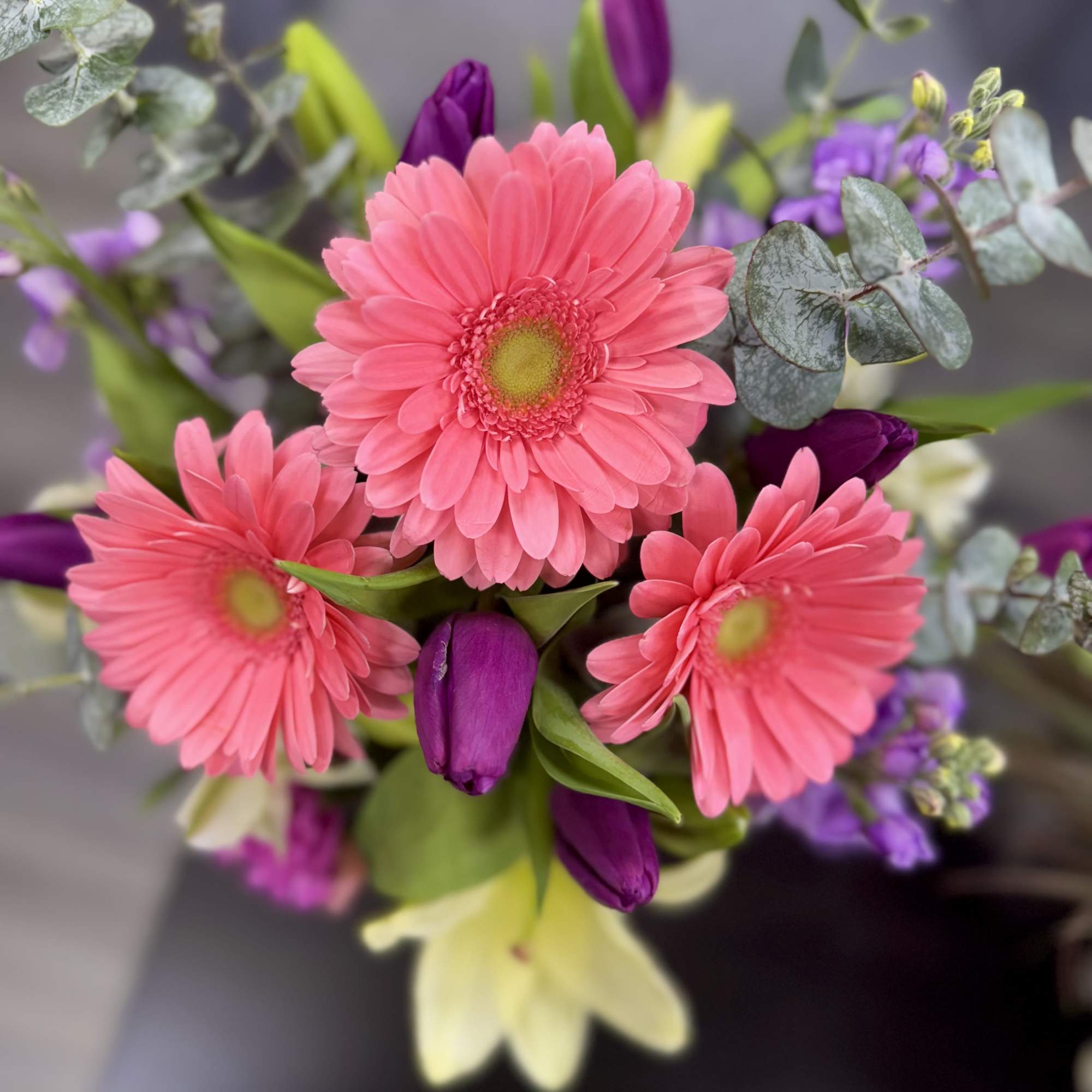 A vibrant arrangement that combines the sweetness of pink gerberas, the elegance