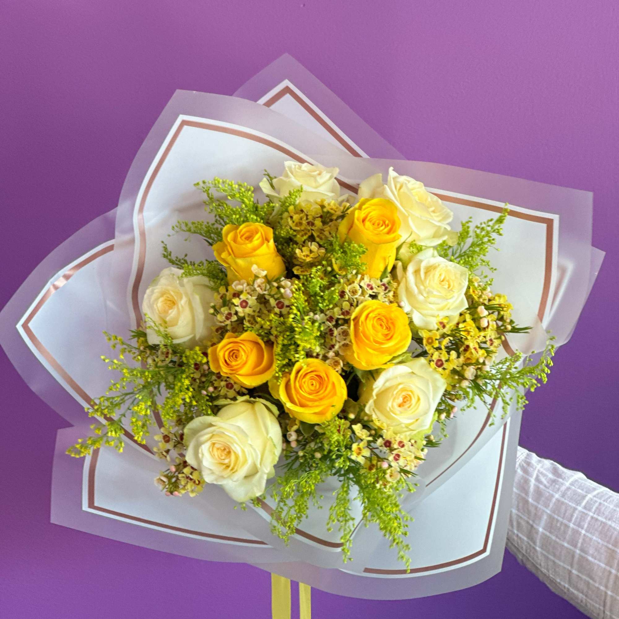 A bouquet of different colored flowers will give a lot of smiles