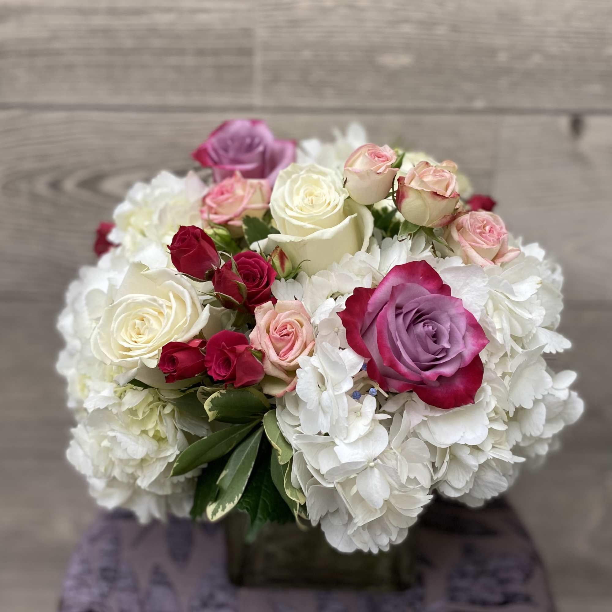 Send a little love their way.    A square vase