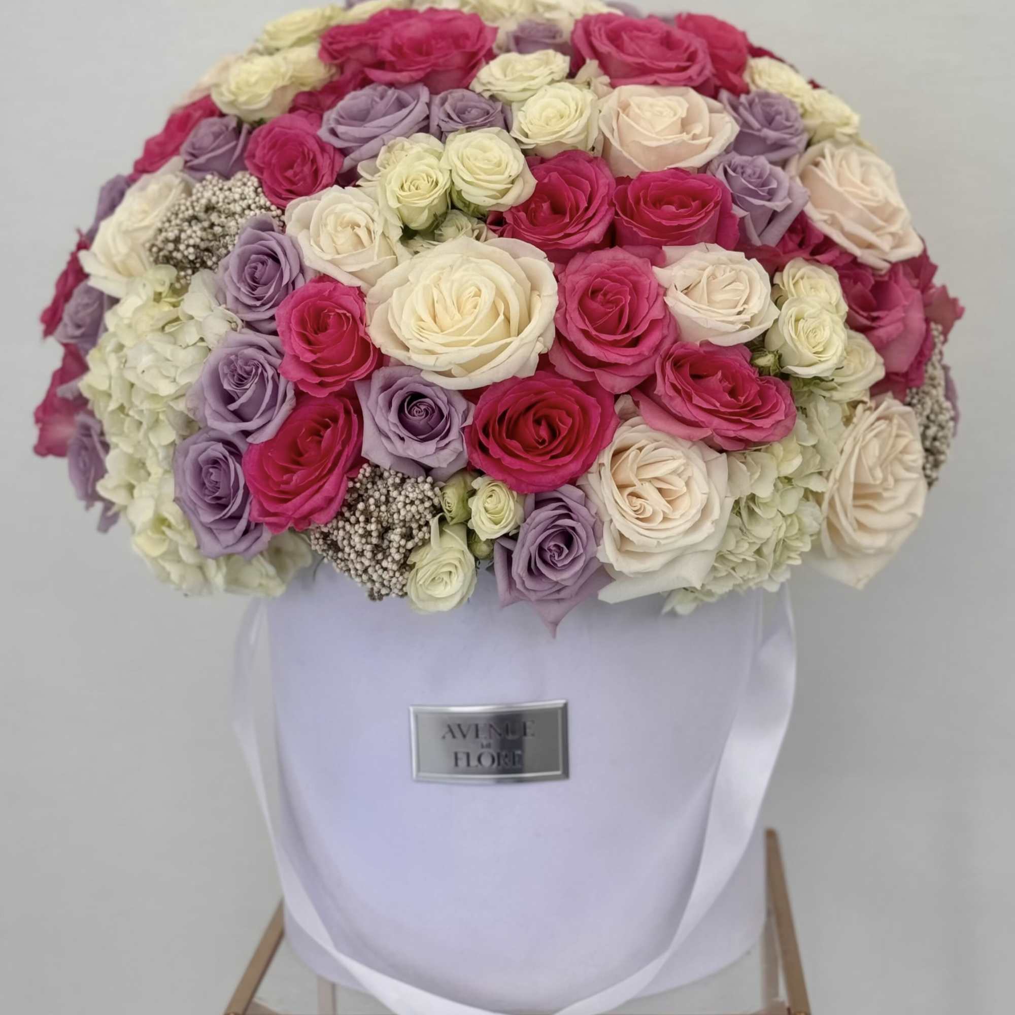 Introducing a luxurious velvet box brimming with the delicate beauty of pink