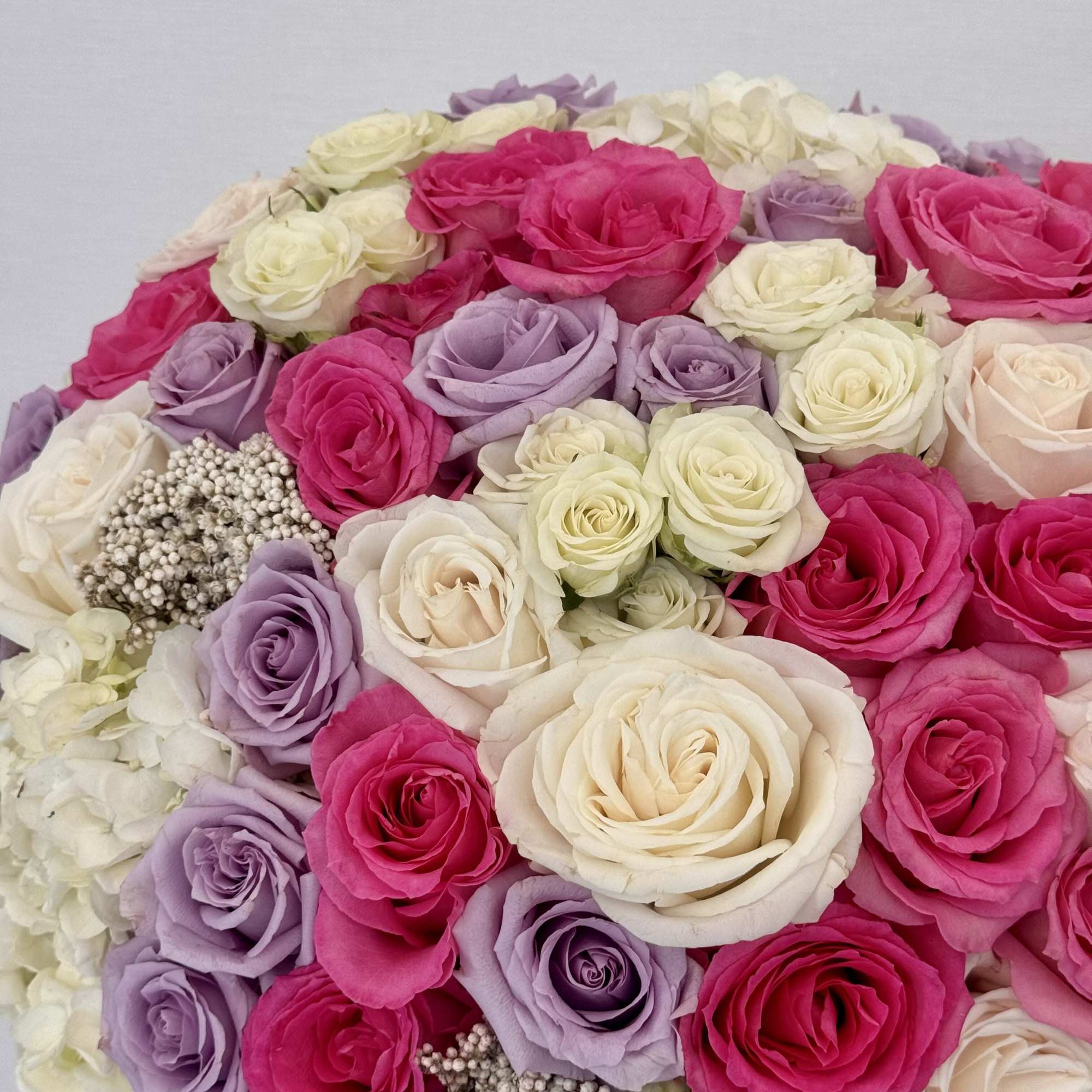 Introducing a luxurious velvet box brimming with the delicate beauty of pink