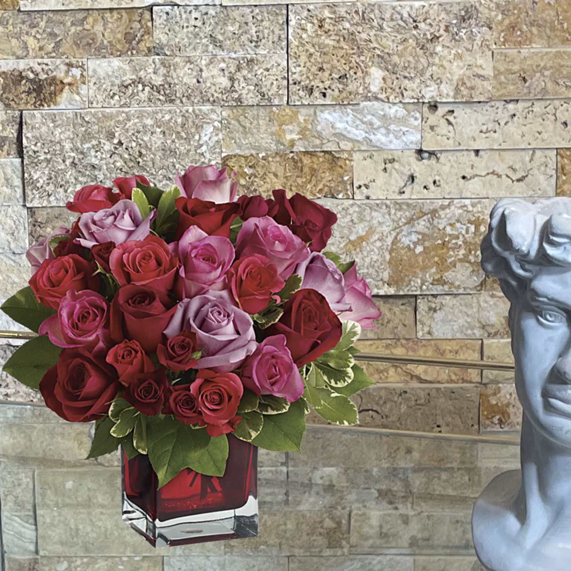 Surprise her with roses in four gorgeous shades of love artistically arranged Surprise her with roses in four gorgeous shades of love artistically arranged