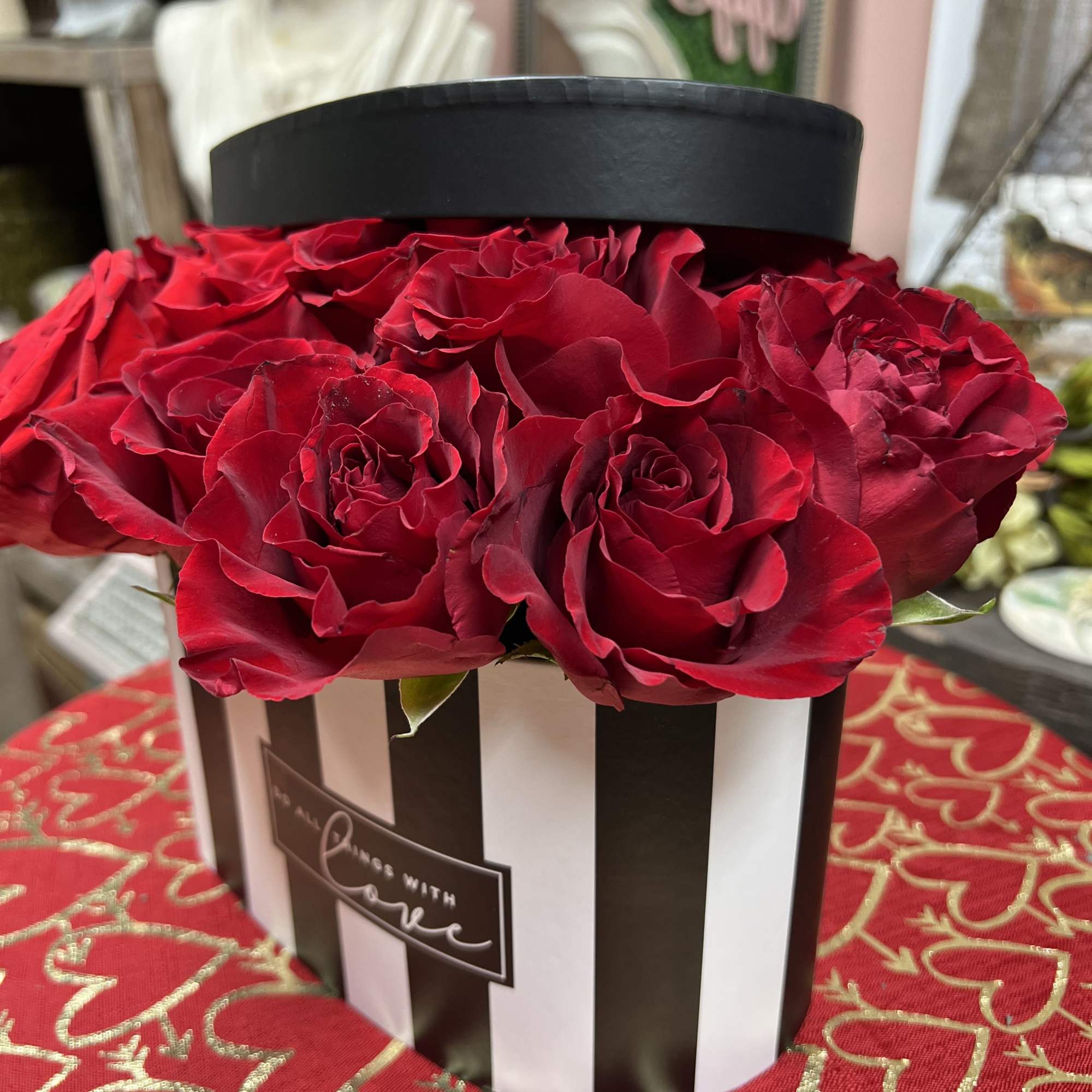 Heart Shaped Black and White Stipped Box with lid  Arrangement. Consist