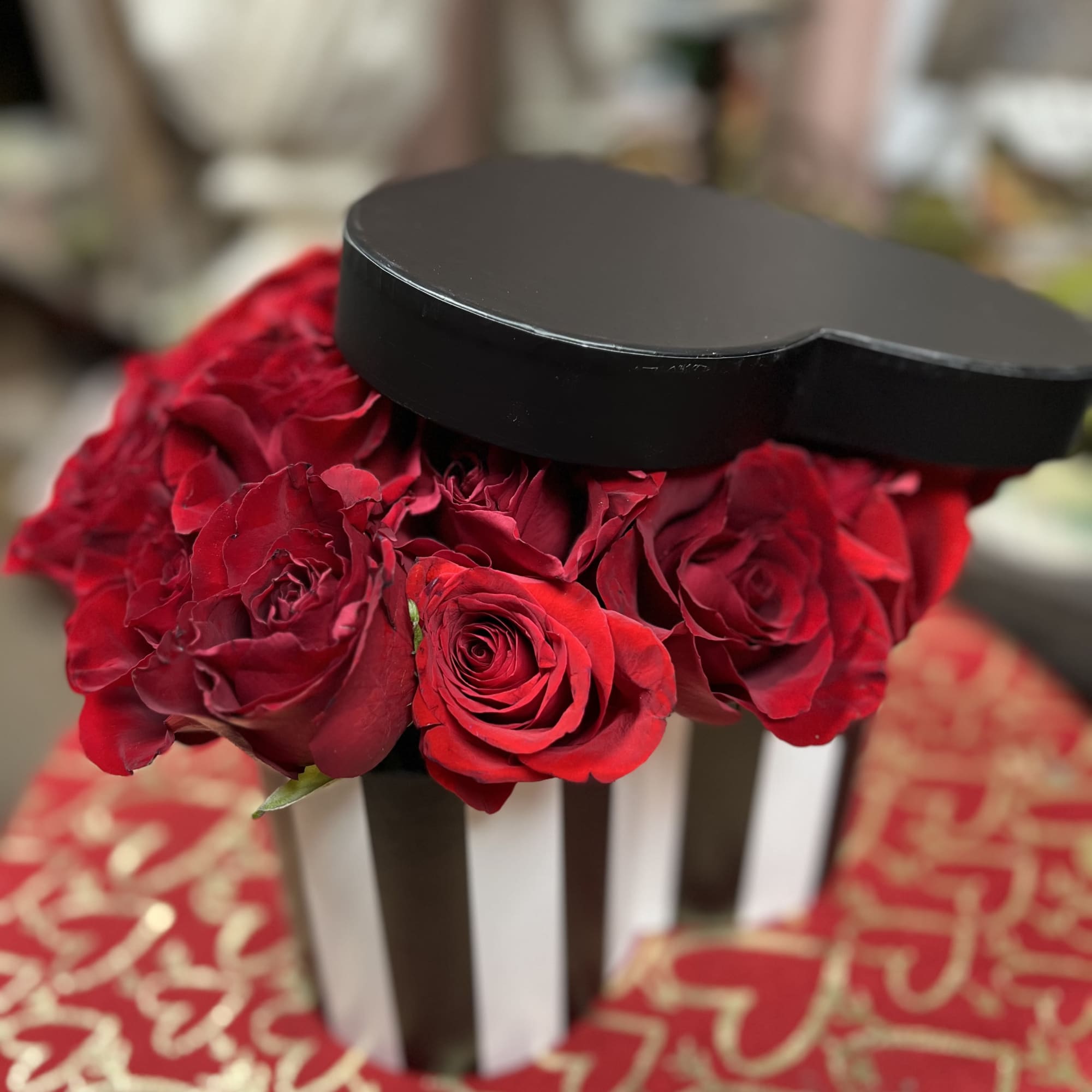 Heart Shaped Black and White Stipped Box with lid  Arrangement. Consist