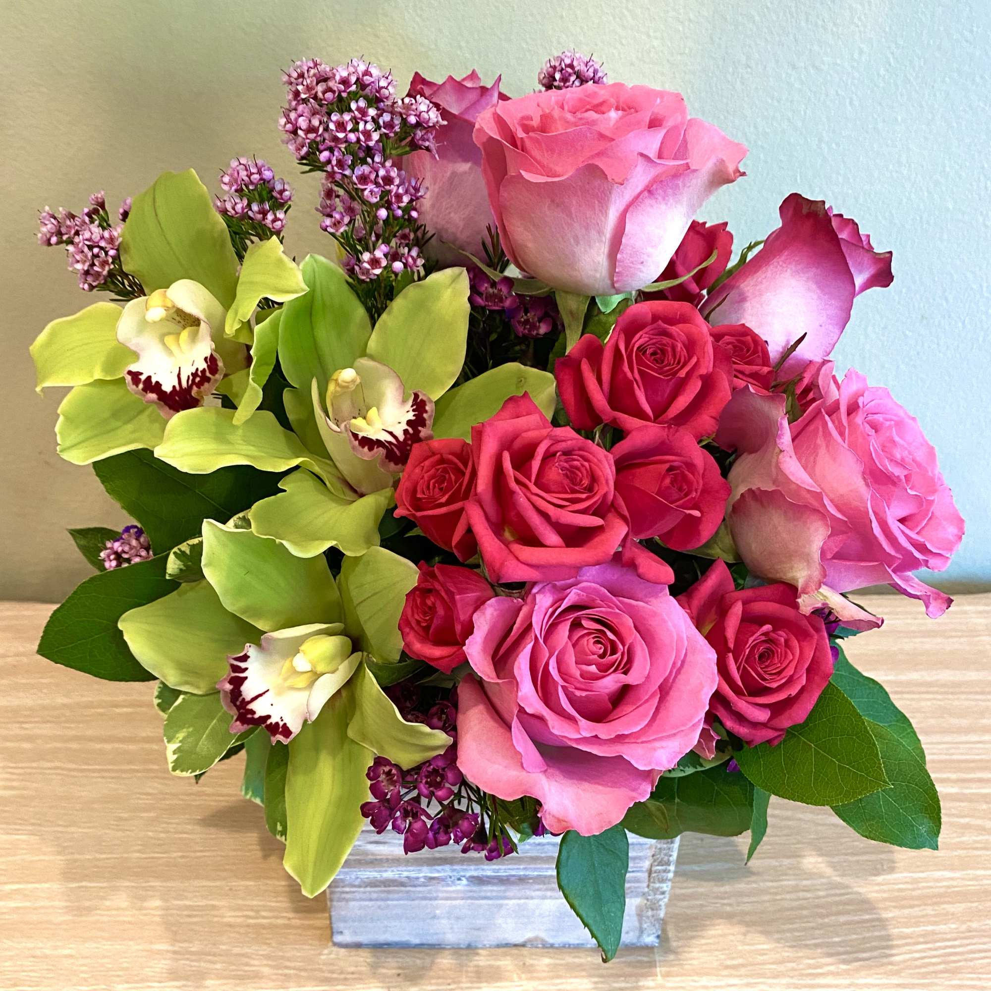 Lovely Box of Pink Flowers with Purple Accent