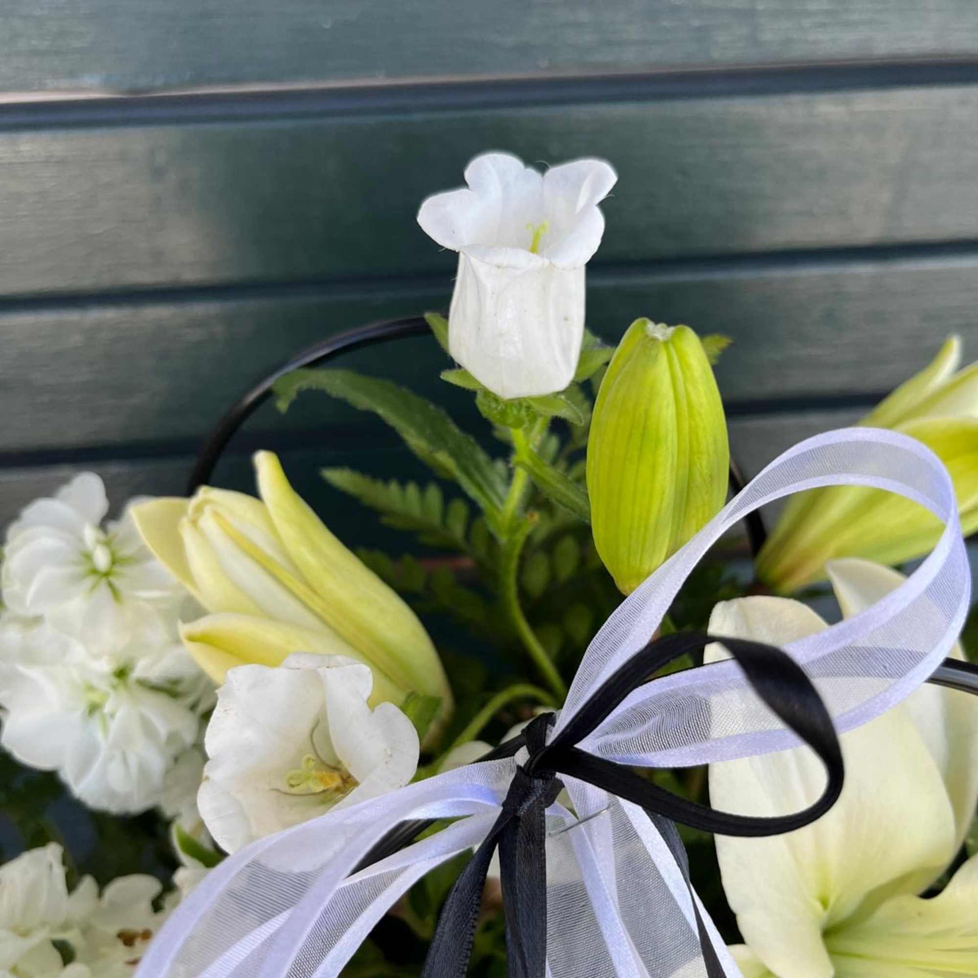 Elevate your occasion with this clear black &amp; white floral expression! Well