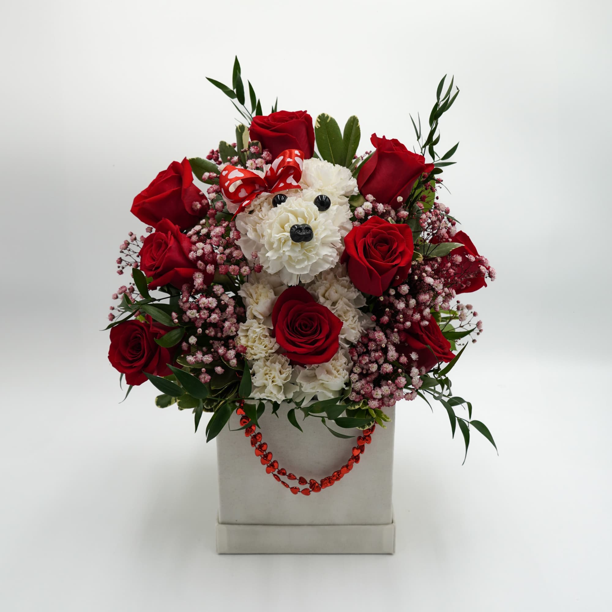Includes Red Roses, Carnations, baby breaths, and mixed greenery 
Square Plush Box Includes Red Roses, Carnations, baby breaths, and mixed greenery 
Square Plush Box