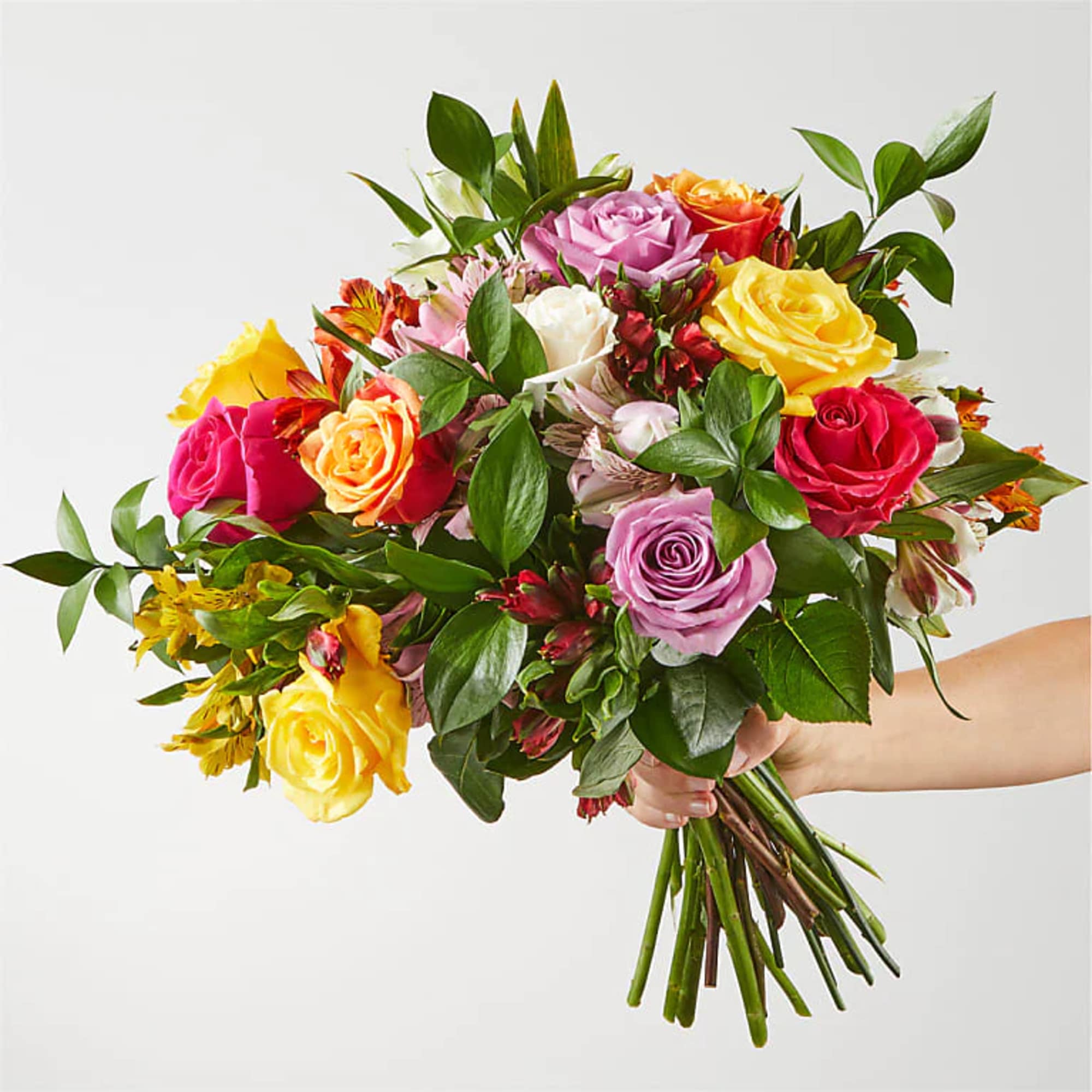 Bring a rainbow of color to any home with this bouquet. Blooming