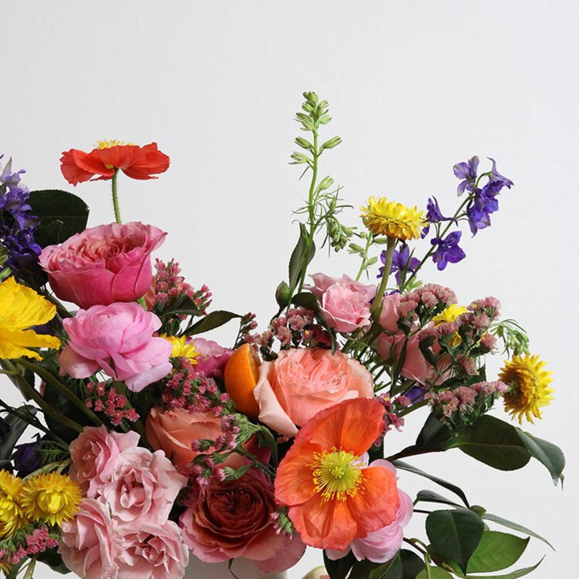 - REFRESHING AND VIBRANT CENTERPIECE
- MULTI COLORED ARRANGEMENT
- ENLIVENS ANY SPACE
