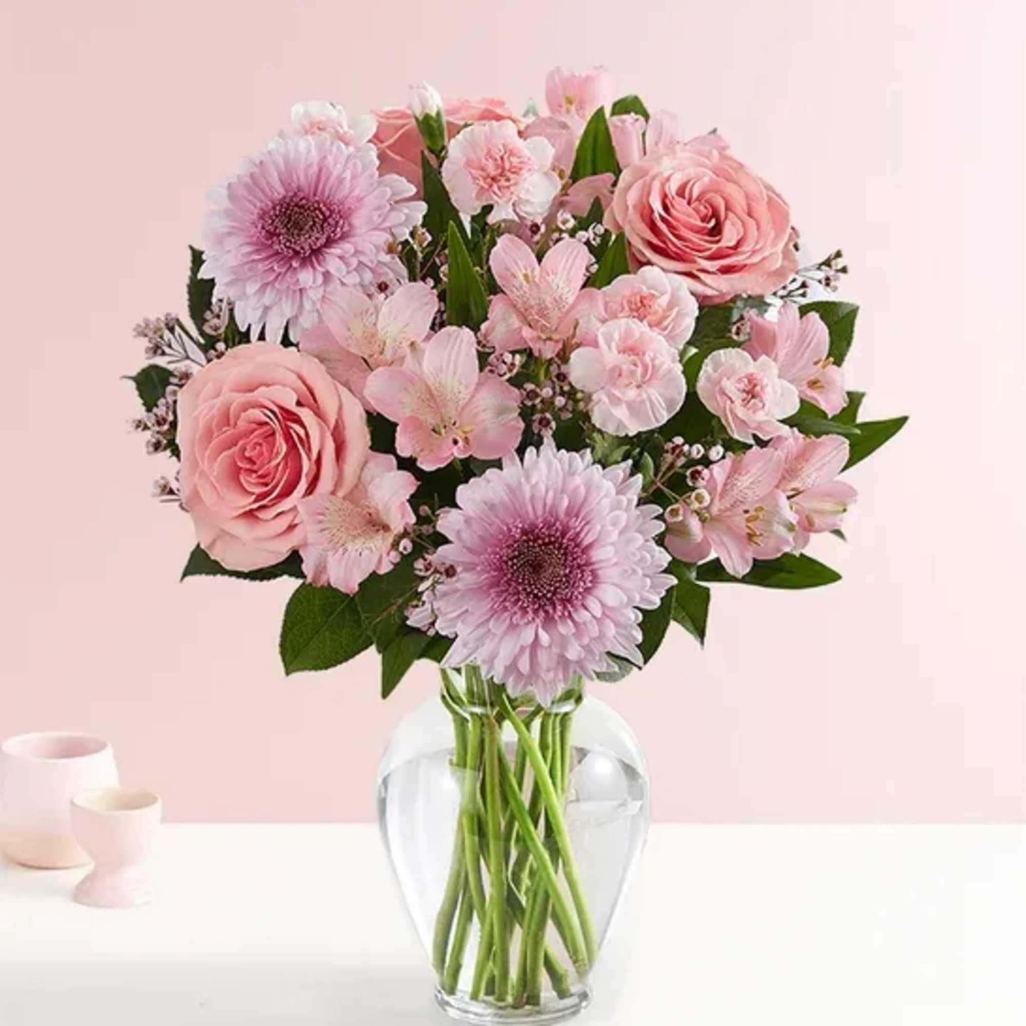 Budding romance or longtime love, this pink and lavender bouquet is hand-designed