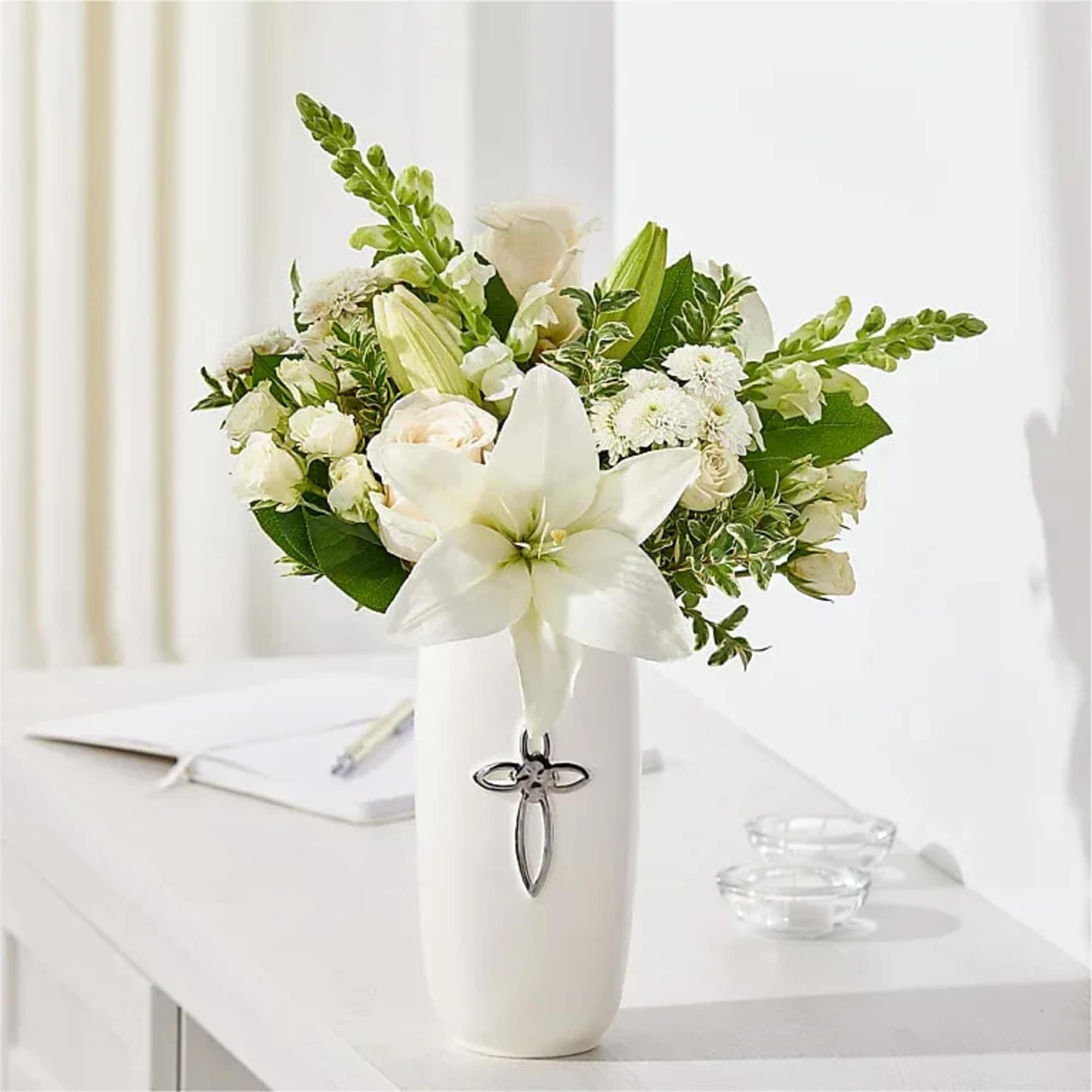 This bouquet is filled with timeless stems like roses and line flowers
