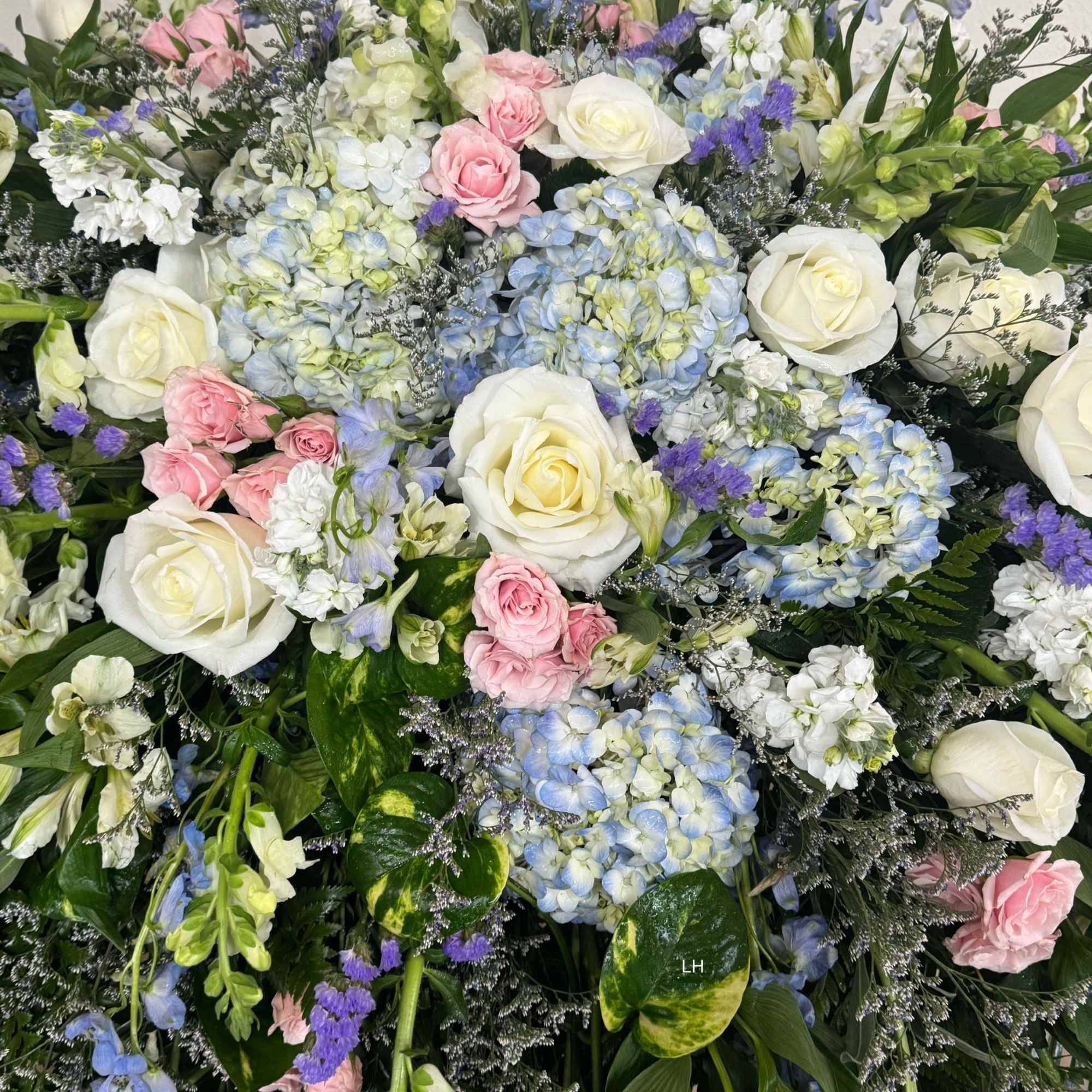 Grettas Garden Casket Spray in Kinder, LA | Petals Flower Shop