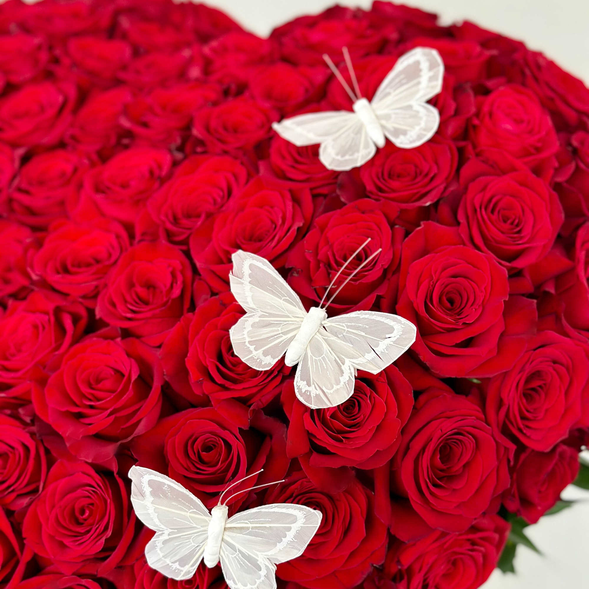 Sweep them off their feet by our stunning standing heart arrangement, overflowing