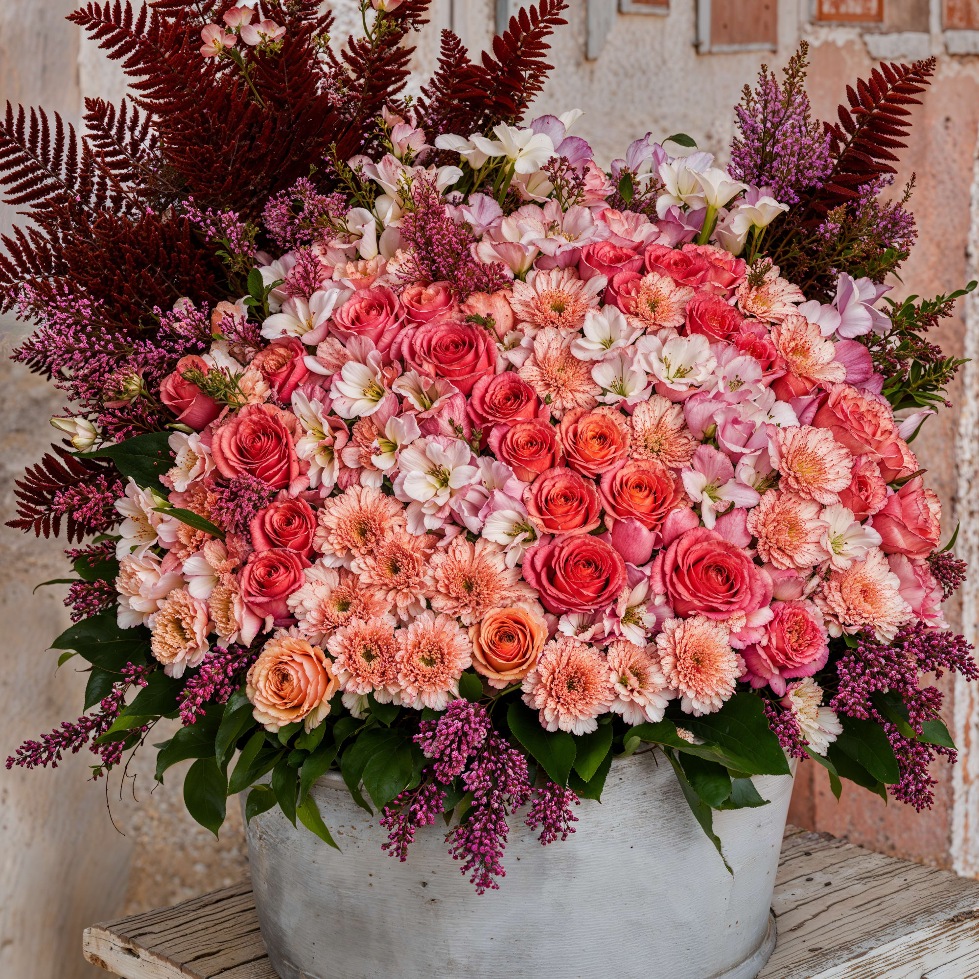 A breathtaking arrangement that exudes luxury and elegance. This opulent display a