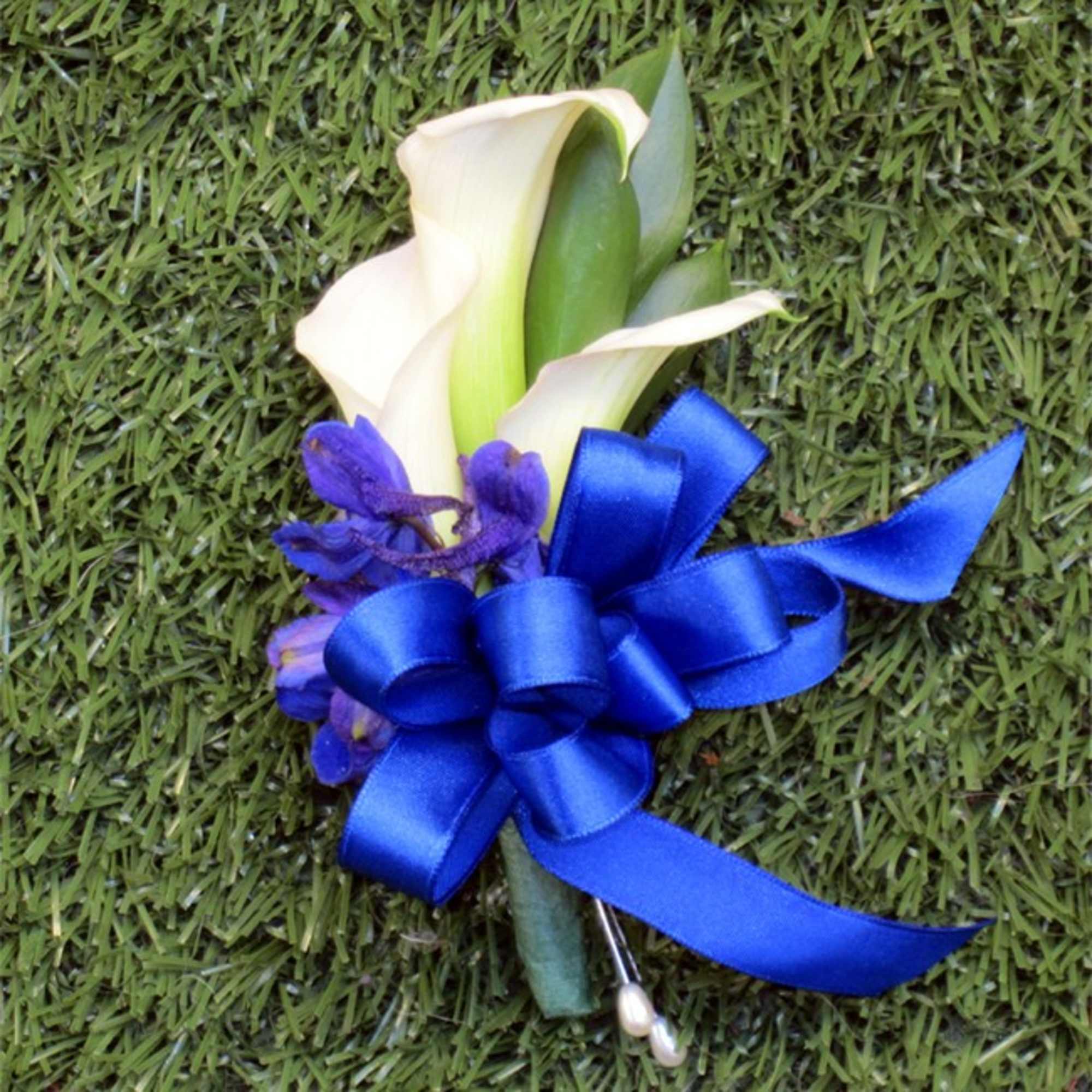 Bridal bouquet of premium Ecuadorian Roses, Mini Calla Lilies and Delphinium. All