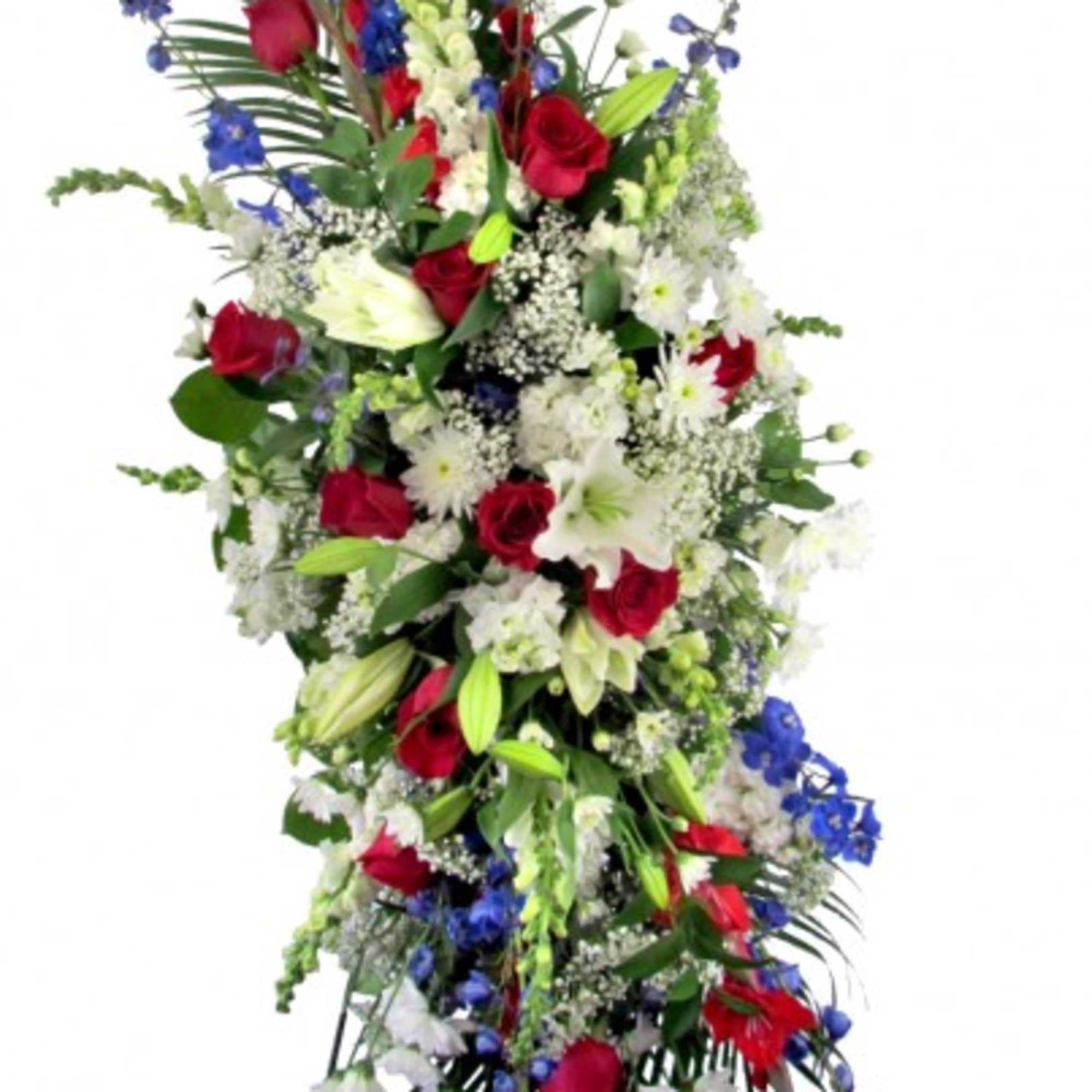 A beautiful and meaningful symbol of love and remembrance, this patriotic spray