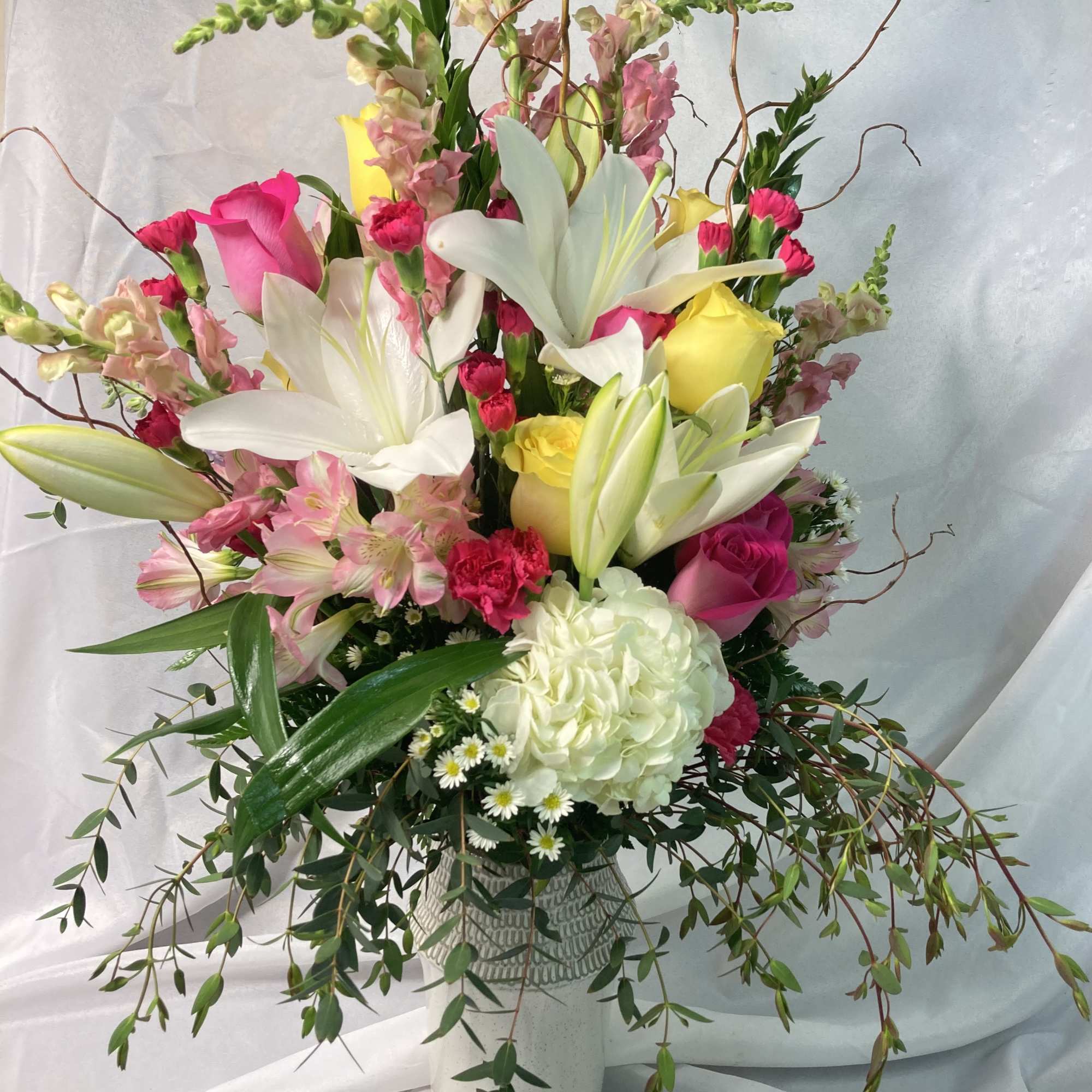 A large display of a whole garden of blooms! This fresh bouquet