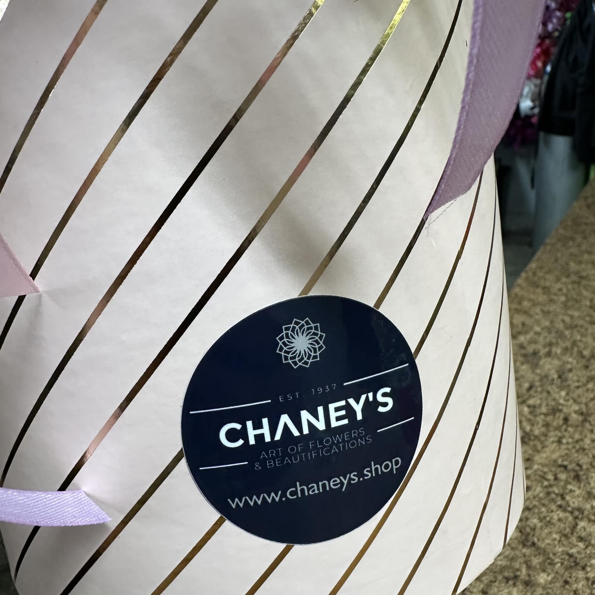 Floral box arrangement fully loaded with pink carnations. 