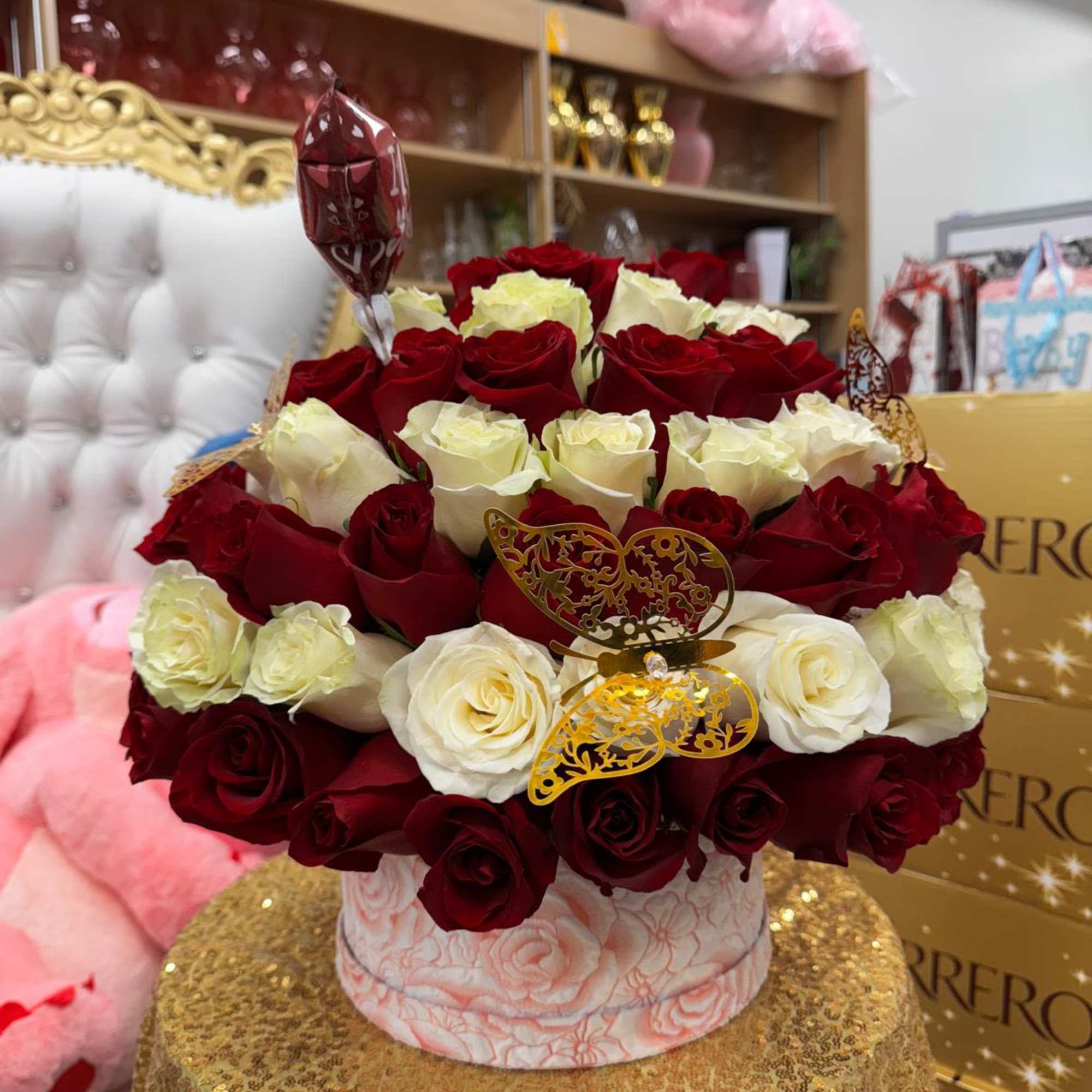 Arrangement of roses on a flower arrangement box