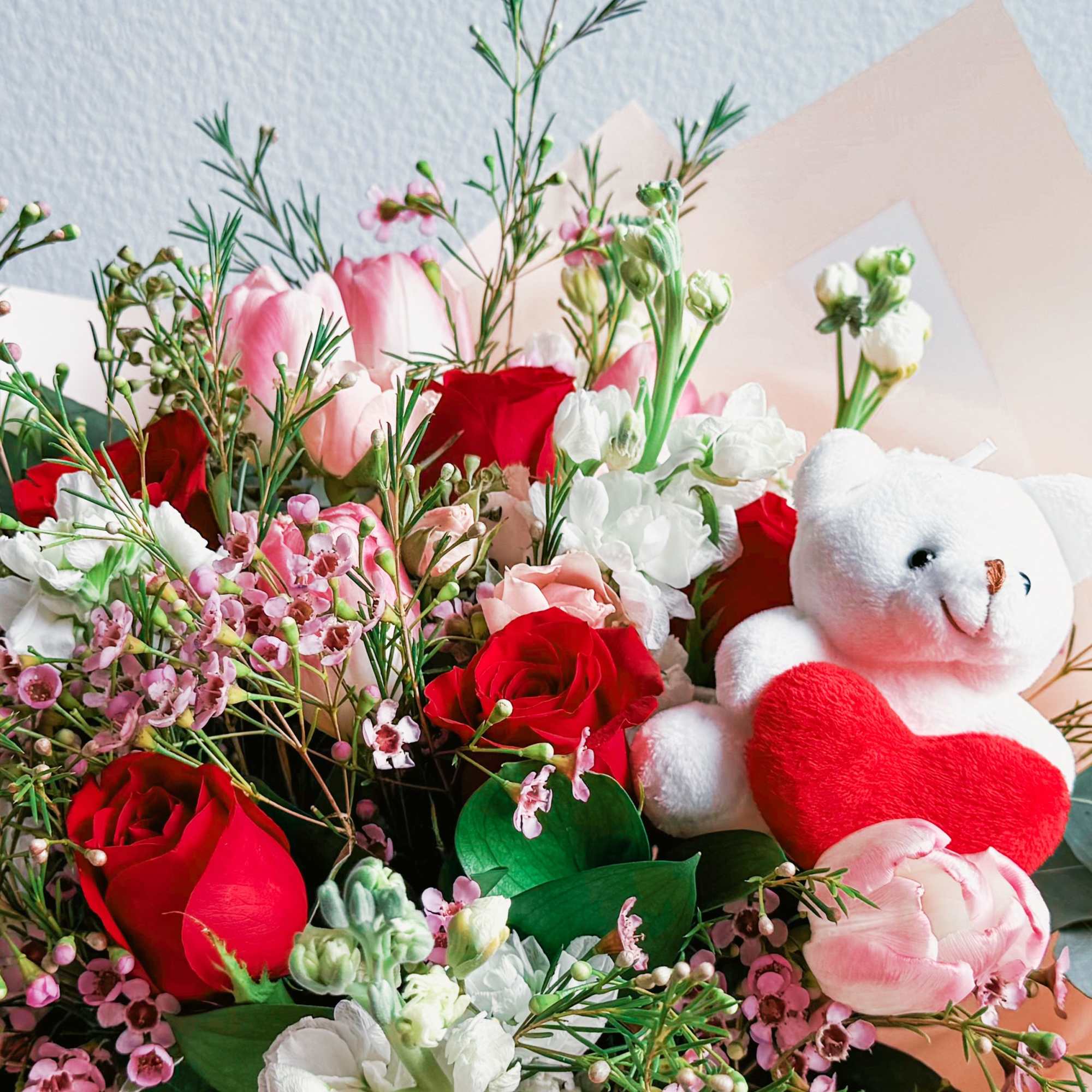 This bouquet is pure sweetness! A dreamy mix of red and blush This bouquet is pure sweetness! A dreamy mix of red and blush