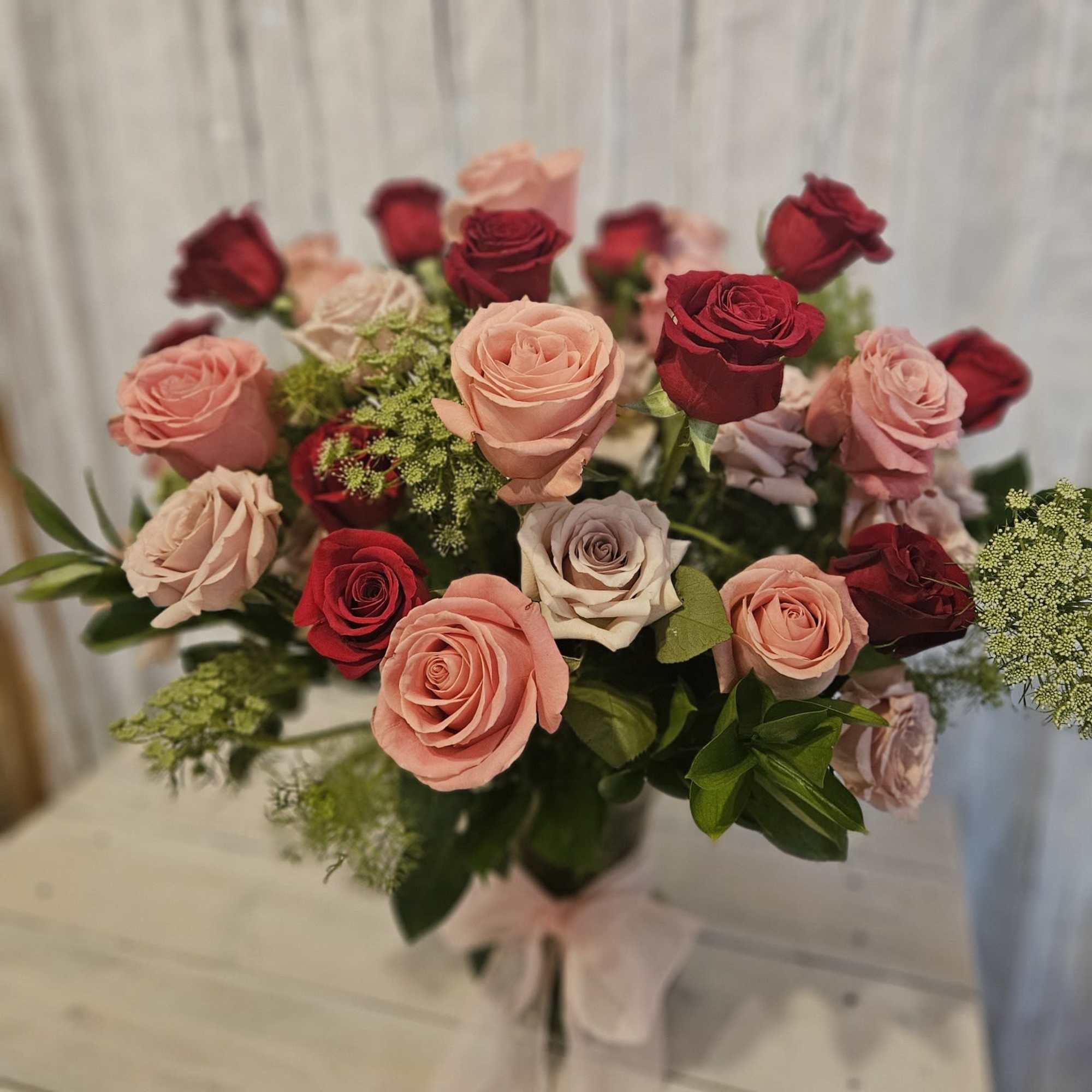 This romantic show stopper has 3 dozen roses of assorted colors. Masterfully This romantic show stopper has 3 dozen roses of assorted colors. Masterfully