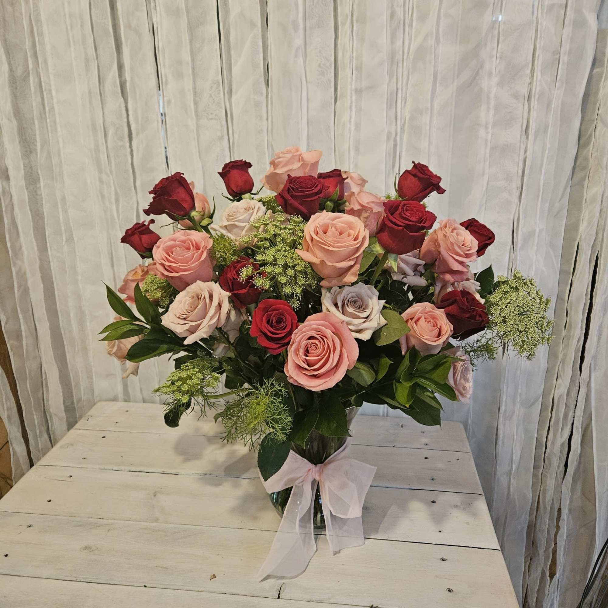 This romantic show stopper has 3 dozen roses of assorted colors. Masterfully This romantic show stopper has 3 dozen roses of assorted colors. Masterfully