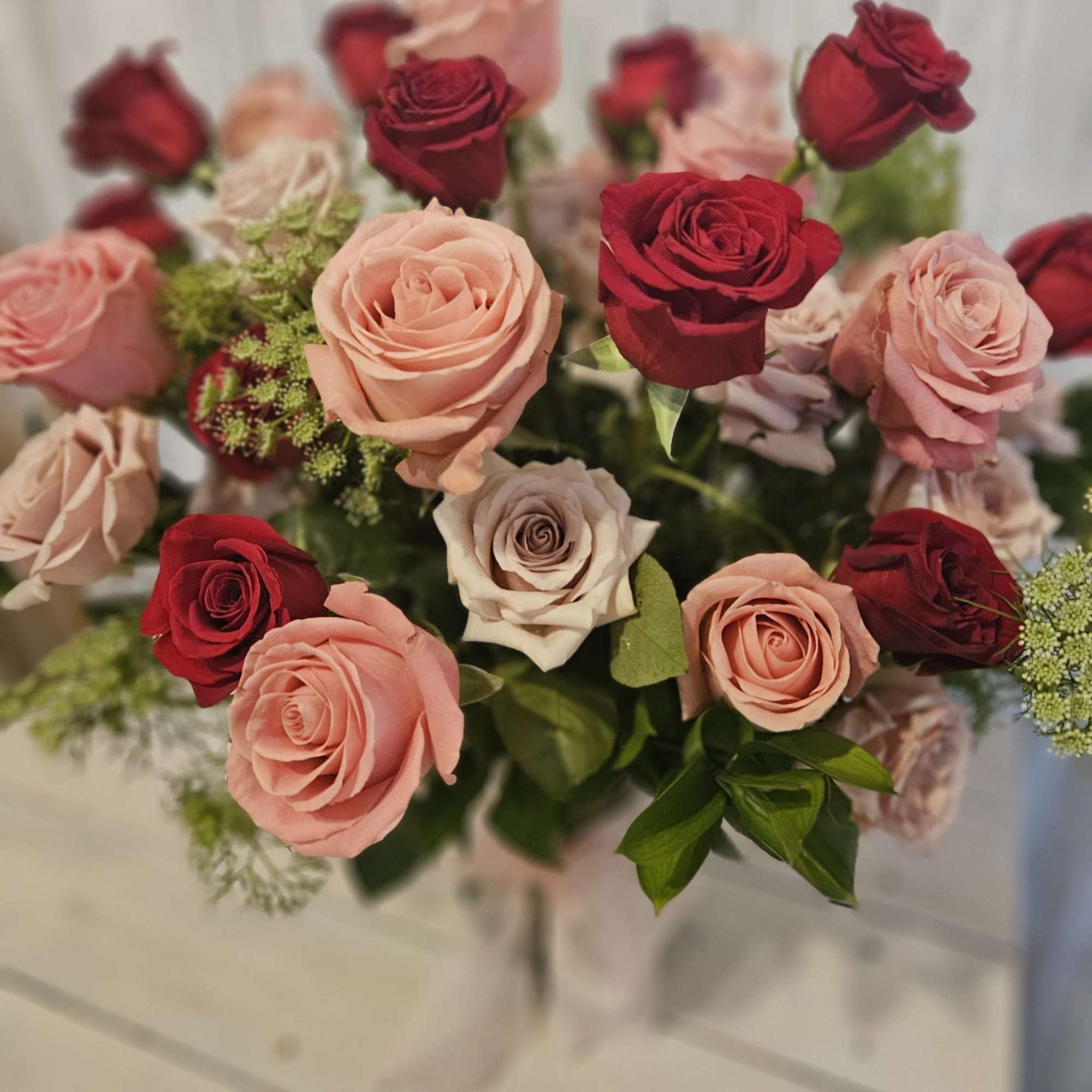 This romantic show stopper has 3 dozen roses of assorted colors. Masterfully This romantic show stopper has 3 dozen roses of assorted colors. Masterfully
