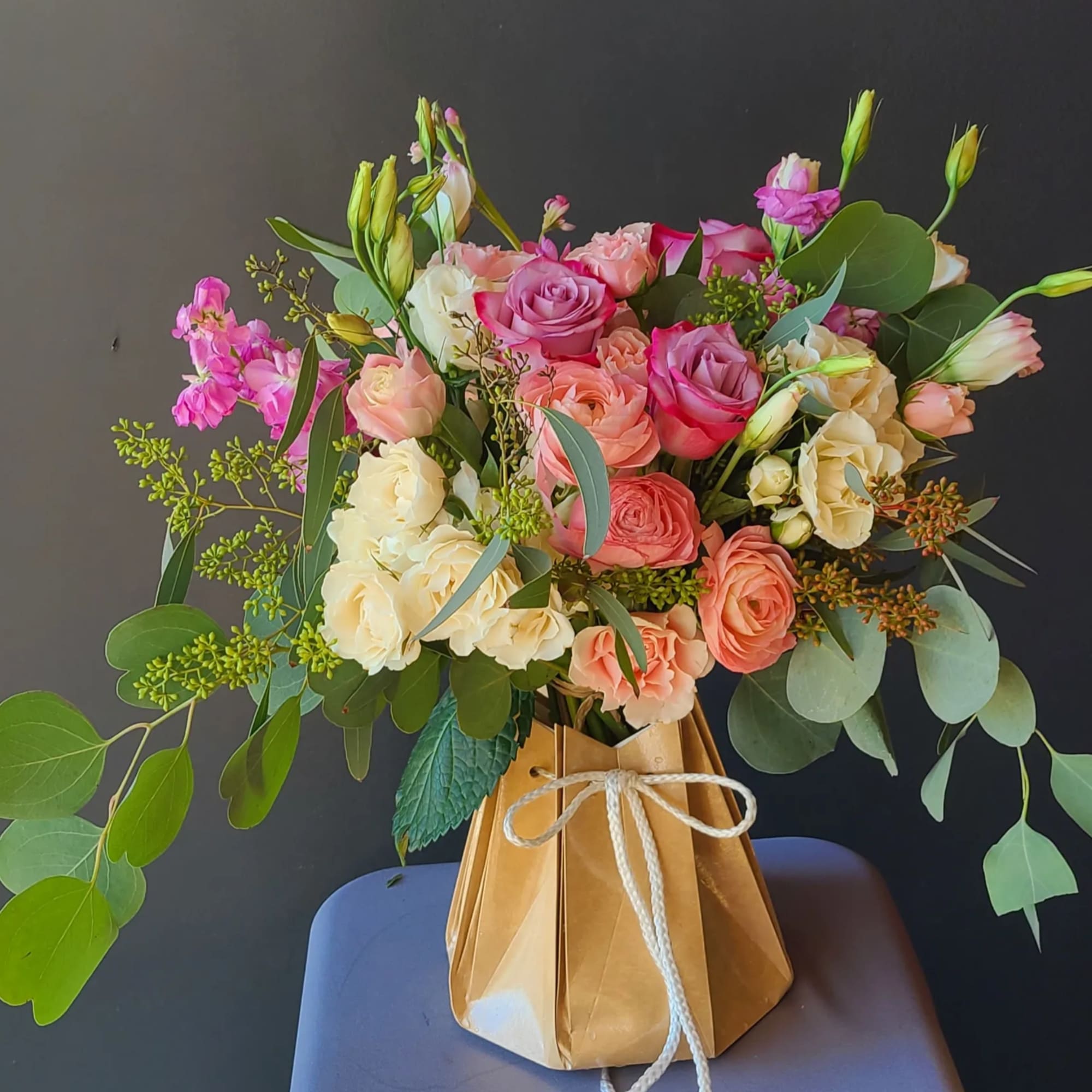 Cool off with this lovely bouquet of roses and hydrangeas. Handtied bouquet