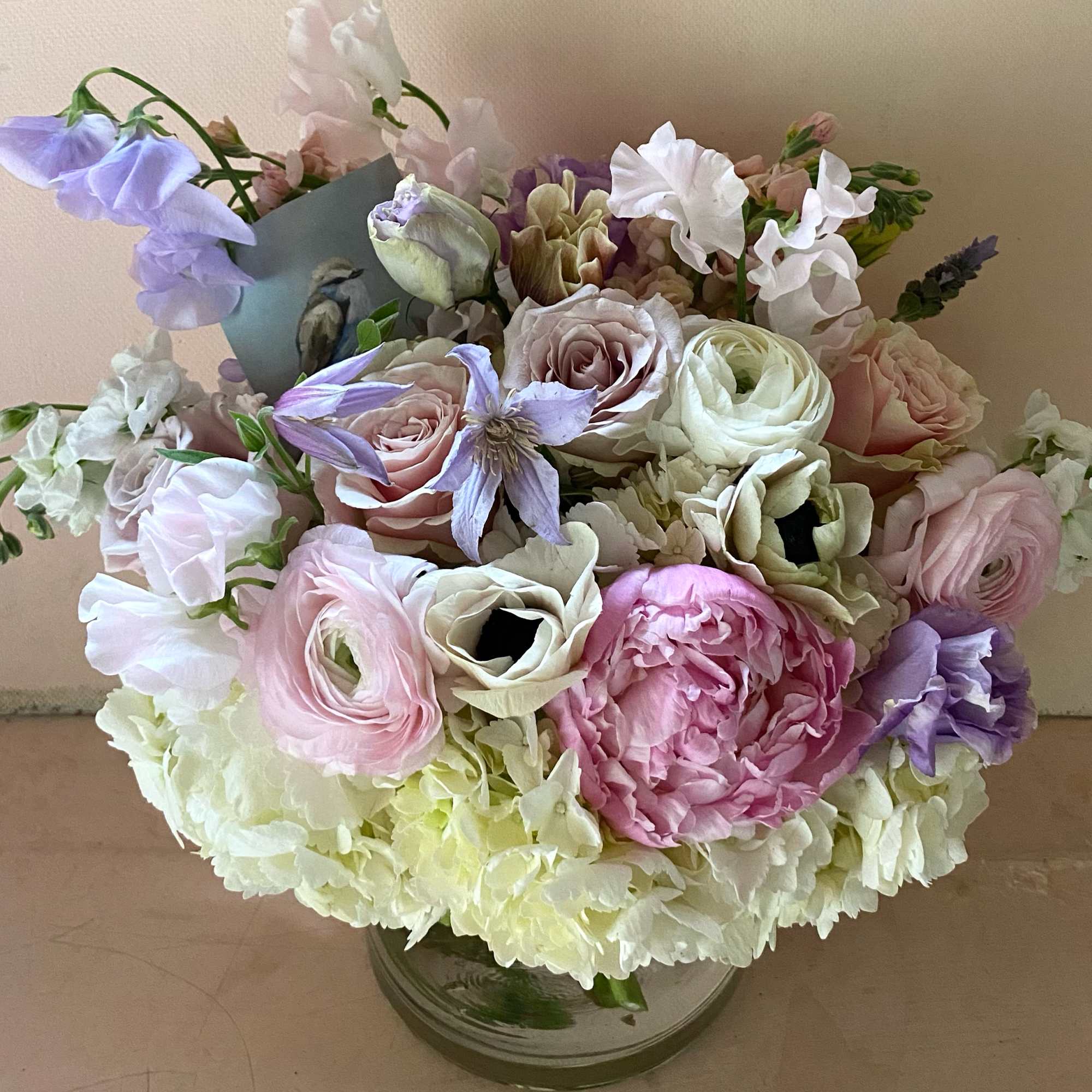 A gorgeous sentiment arrangement in a small 4 by 4" cylinder vase. A gorgeous sentiment arrangement in a small 4 by 4" cylinder vase.