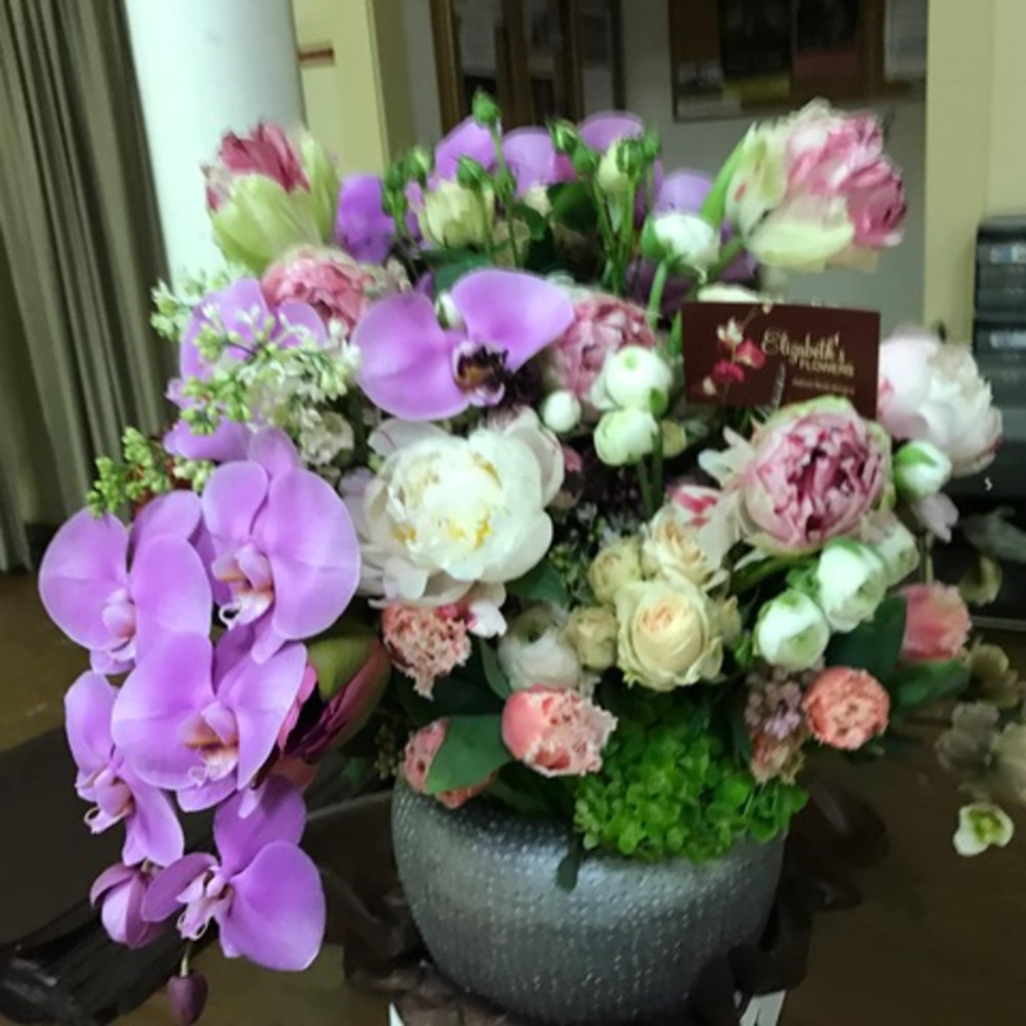 A lush, artful and grand mix of high-end seasonal flowers in pastel A lush, artful and grand mix of high-end seasonal flowers in pastel