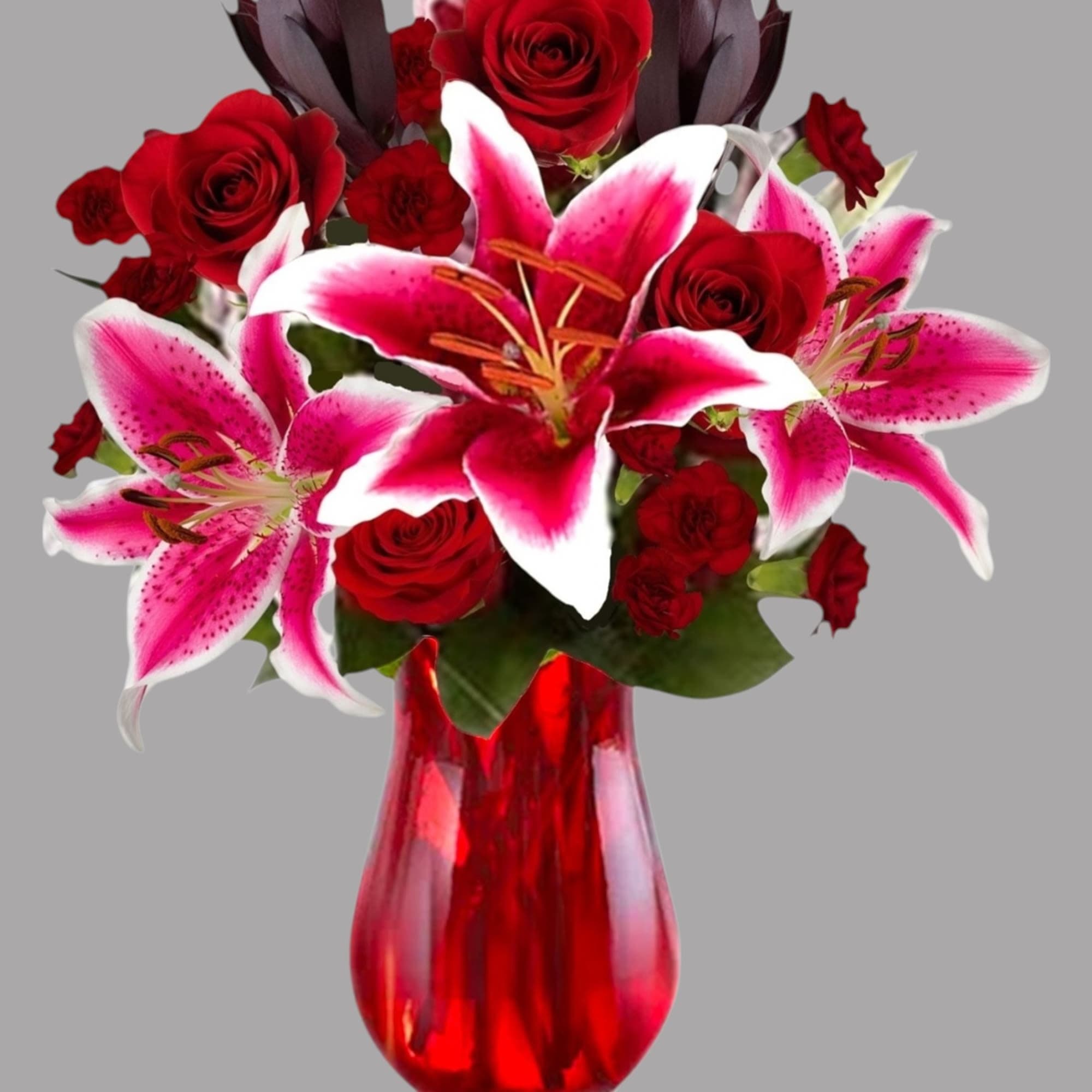 Cupid&#039;s Floral Arrangement blossoms with roses and Stargazer lilies to display your