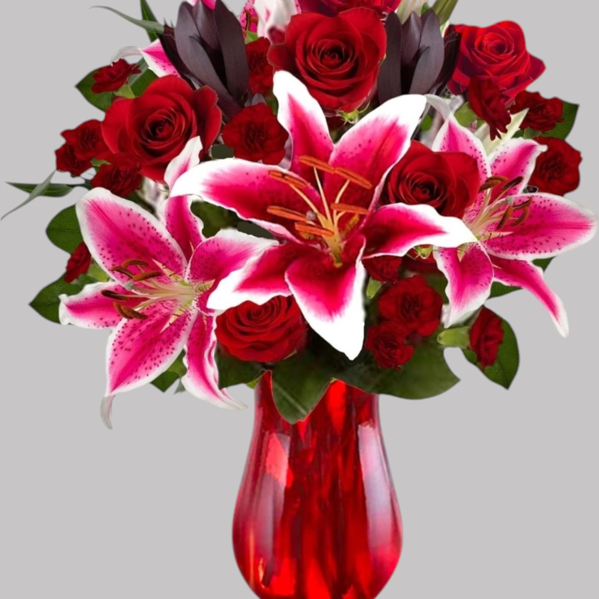 Cupid&#039;s Floral Arrangement blossoms with roses and Stargazer lilies to display your
