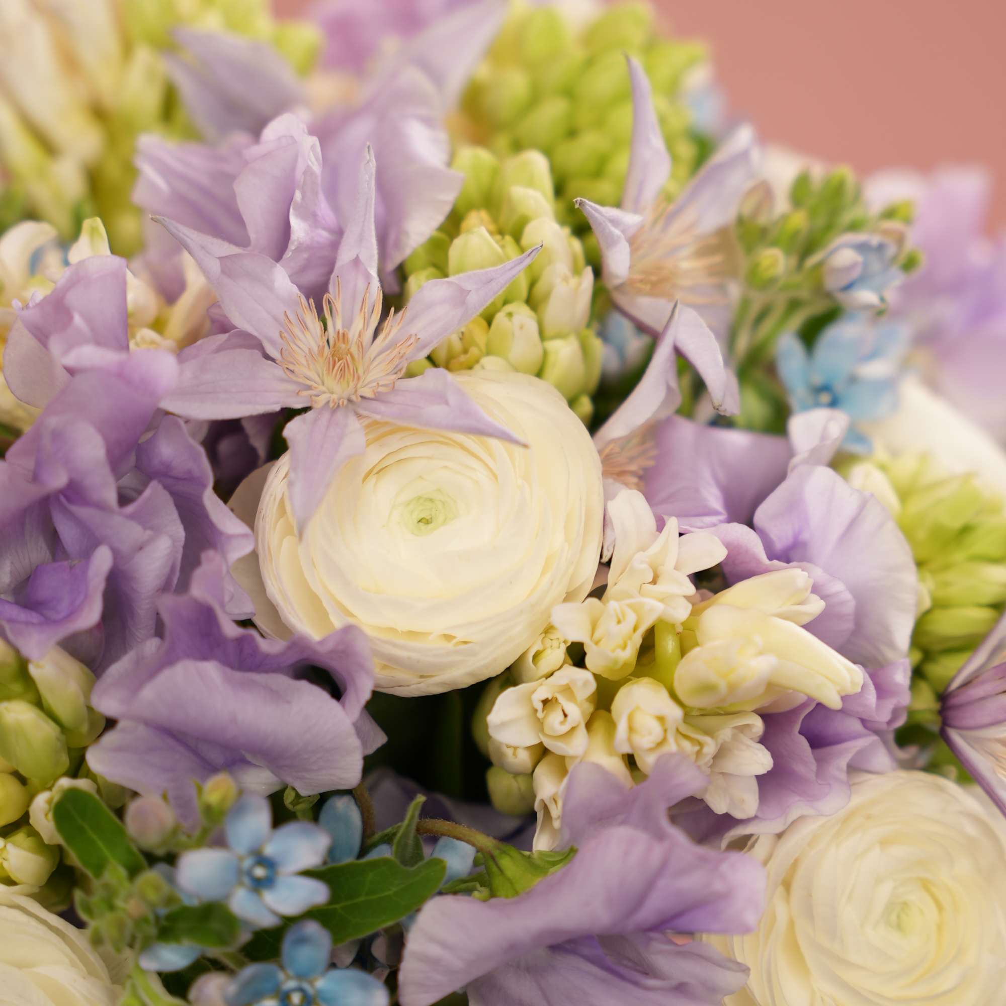 Embrace the enchanting beauty of spring with our &quot;Sapphire Serenade&quot; bouquet, a