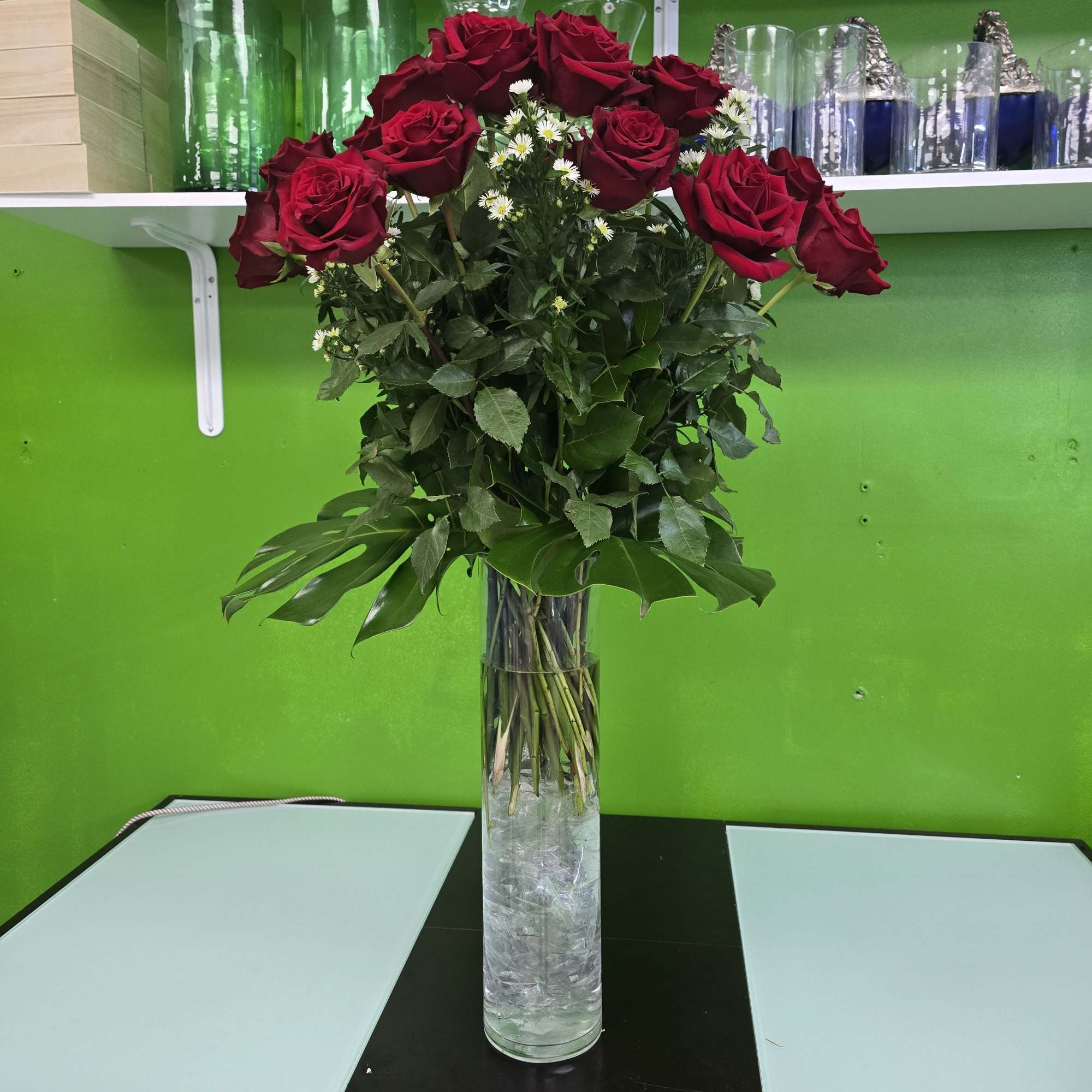 A perfect centerpiece for any occasion. 
24 roses with filler in 20inch