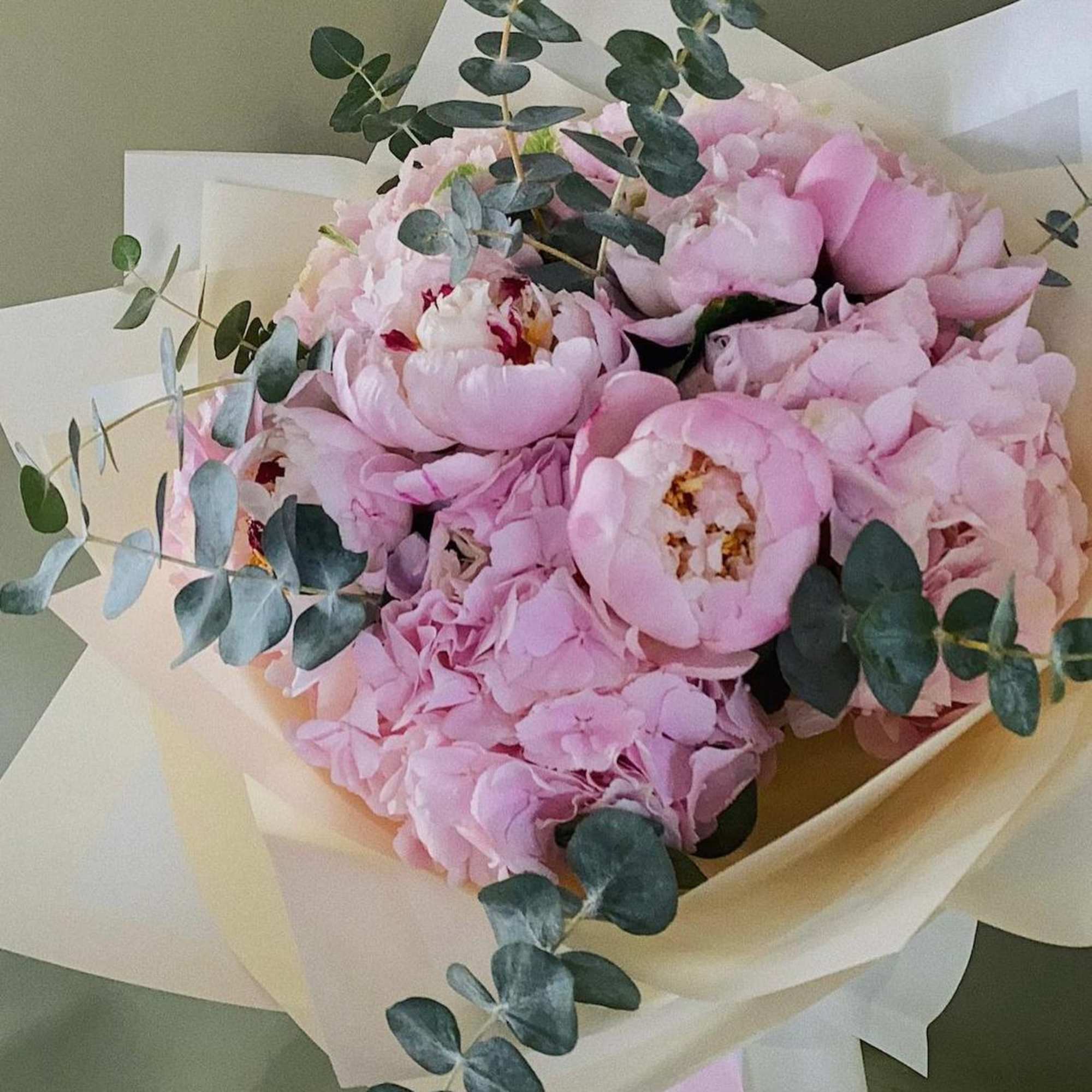 Pink Hydrangeas mixed with peonies and eucalyptus 