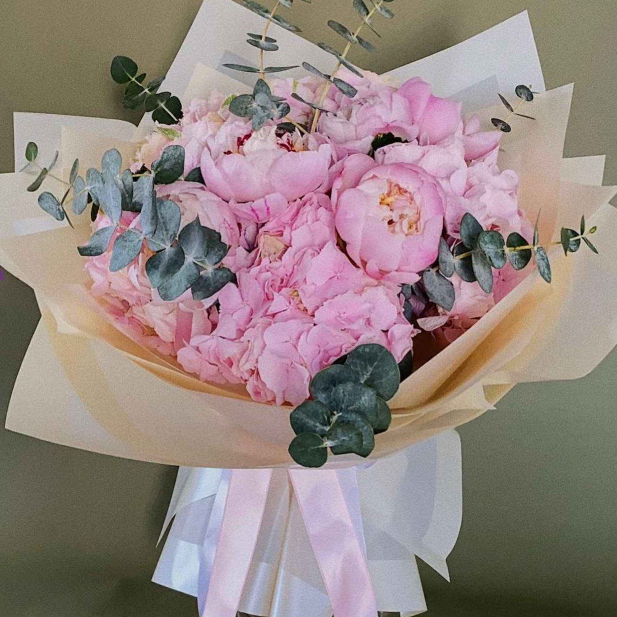 Pink Hydrangeas mixed with peonies and eucalyptus 