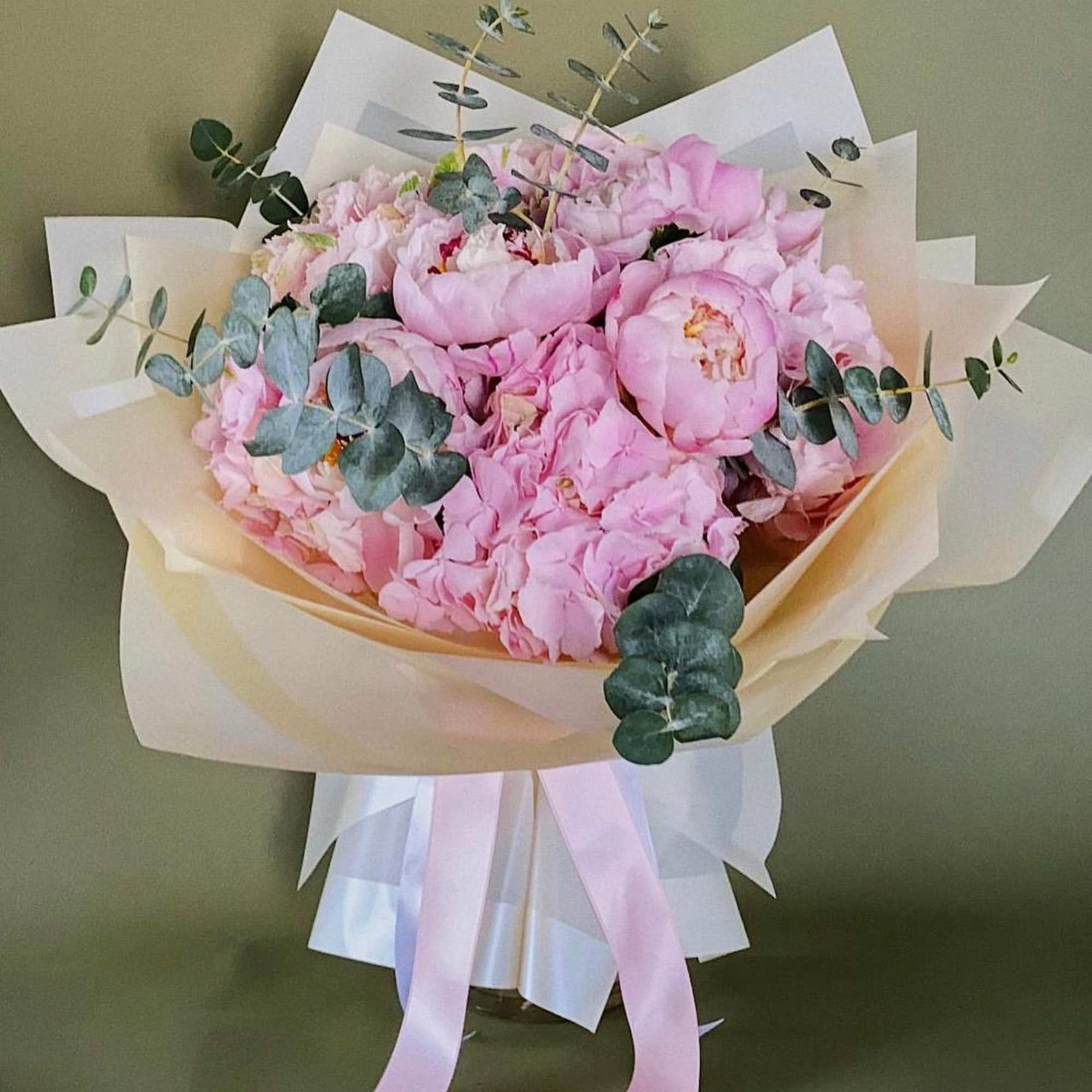 Pink Hydrangeas mixed with peonies and eucalyptus 