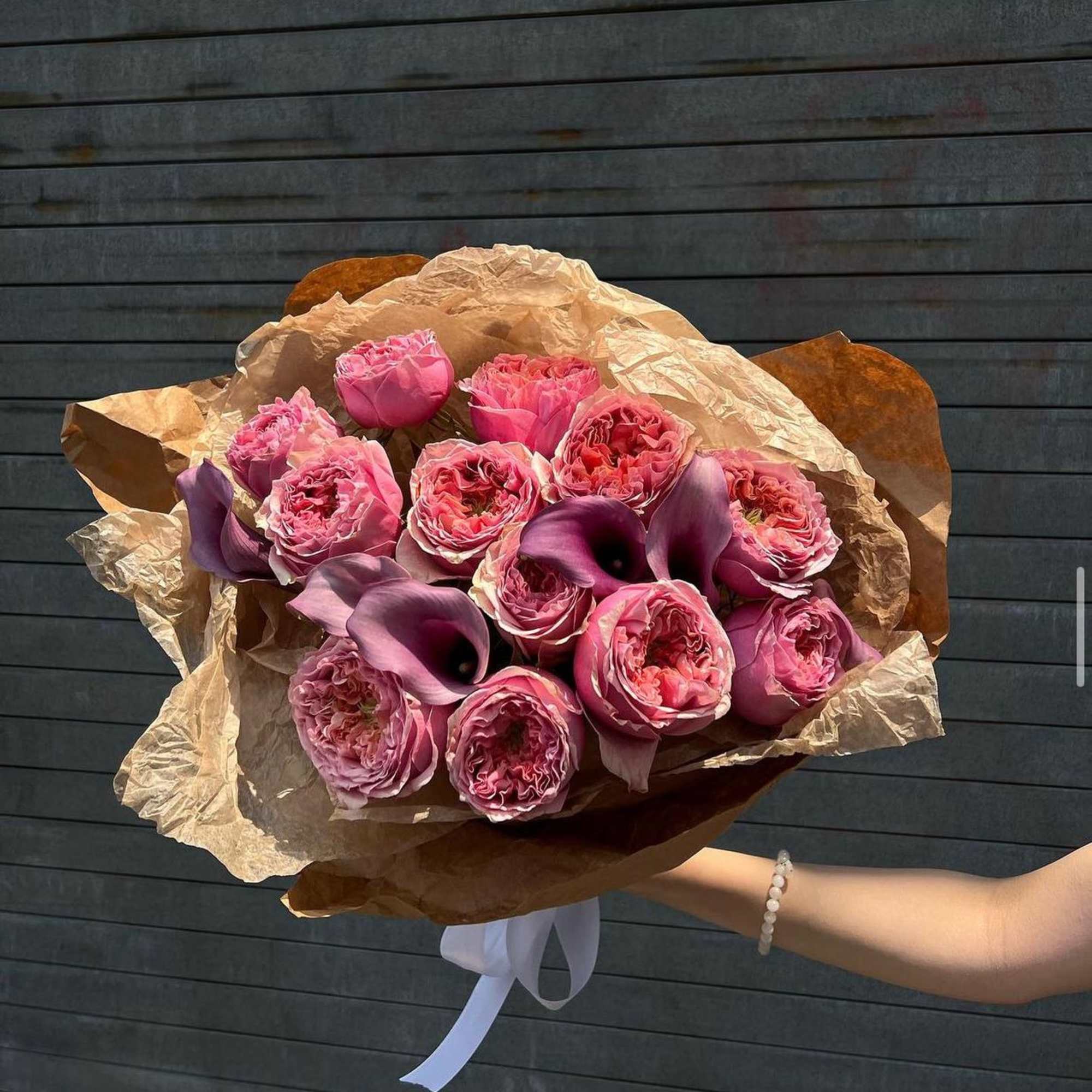 Premium garden roses mixed with calla lilies 