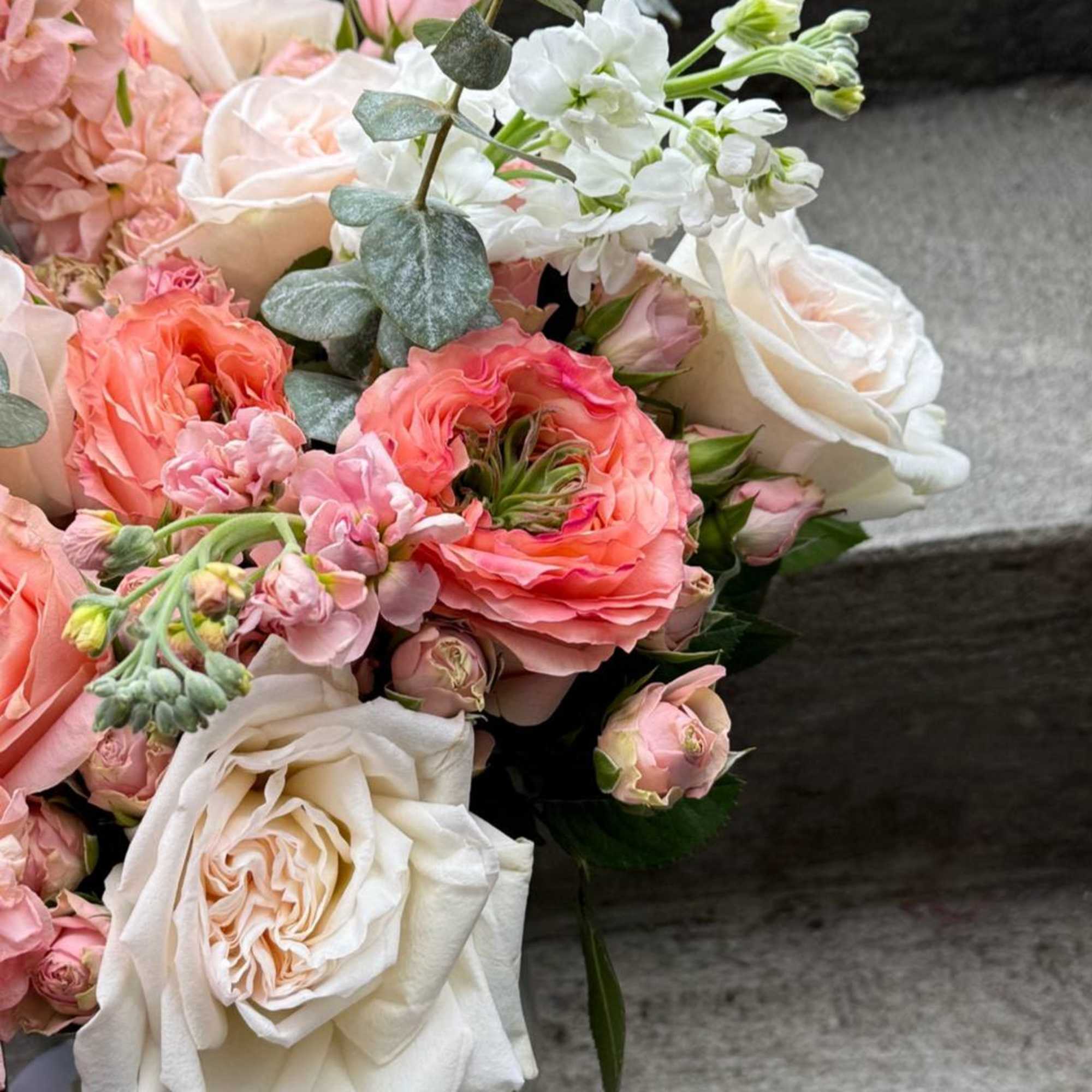 Mix roses with other seasonal flowers